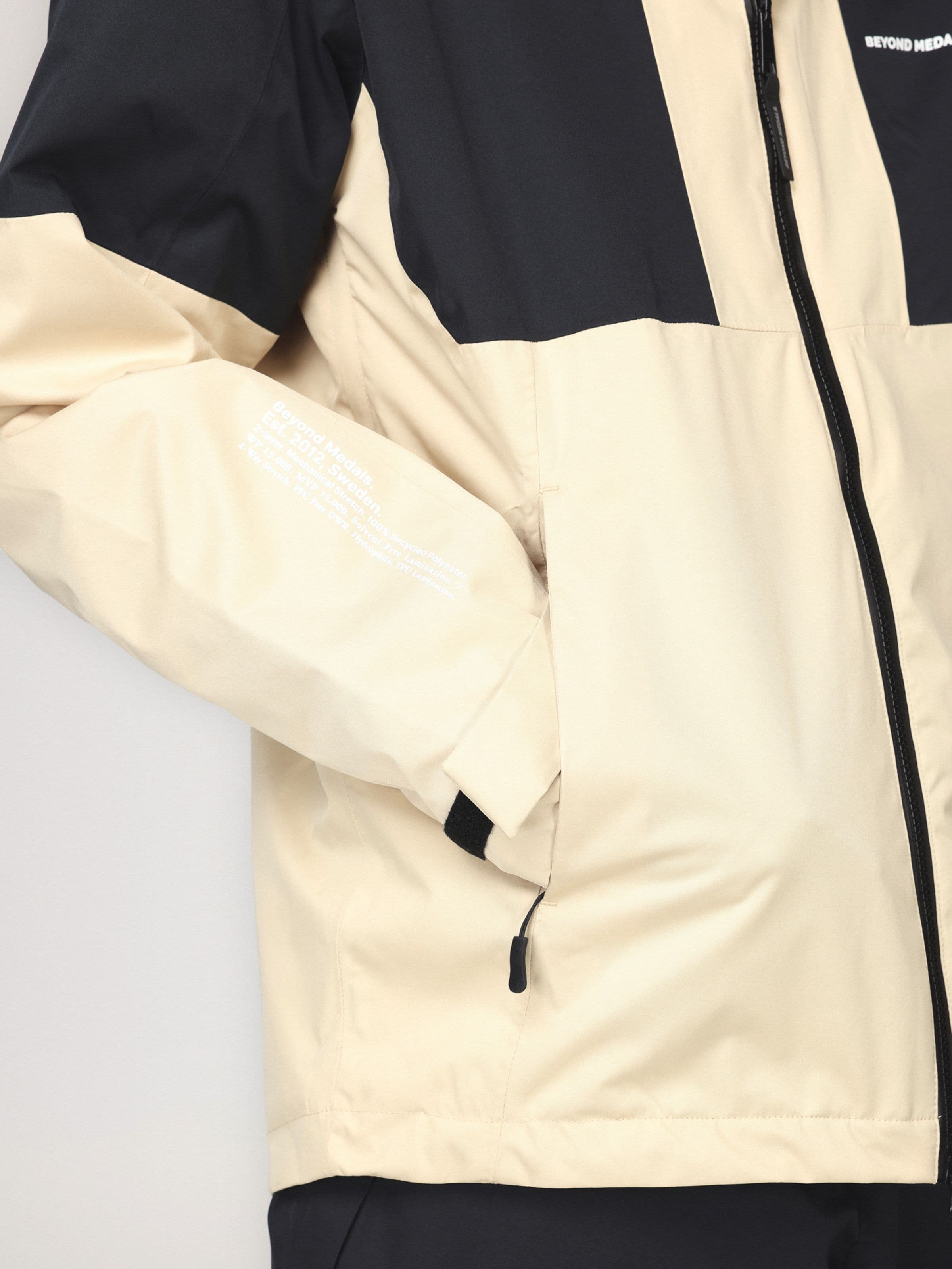 Waterproof jacket, Full Zip Jkt in green worn by model, Beyond Medals, 2024