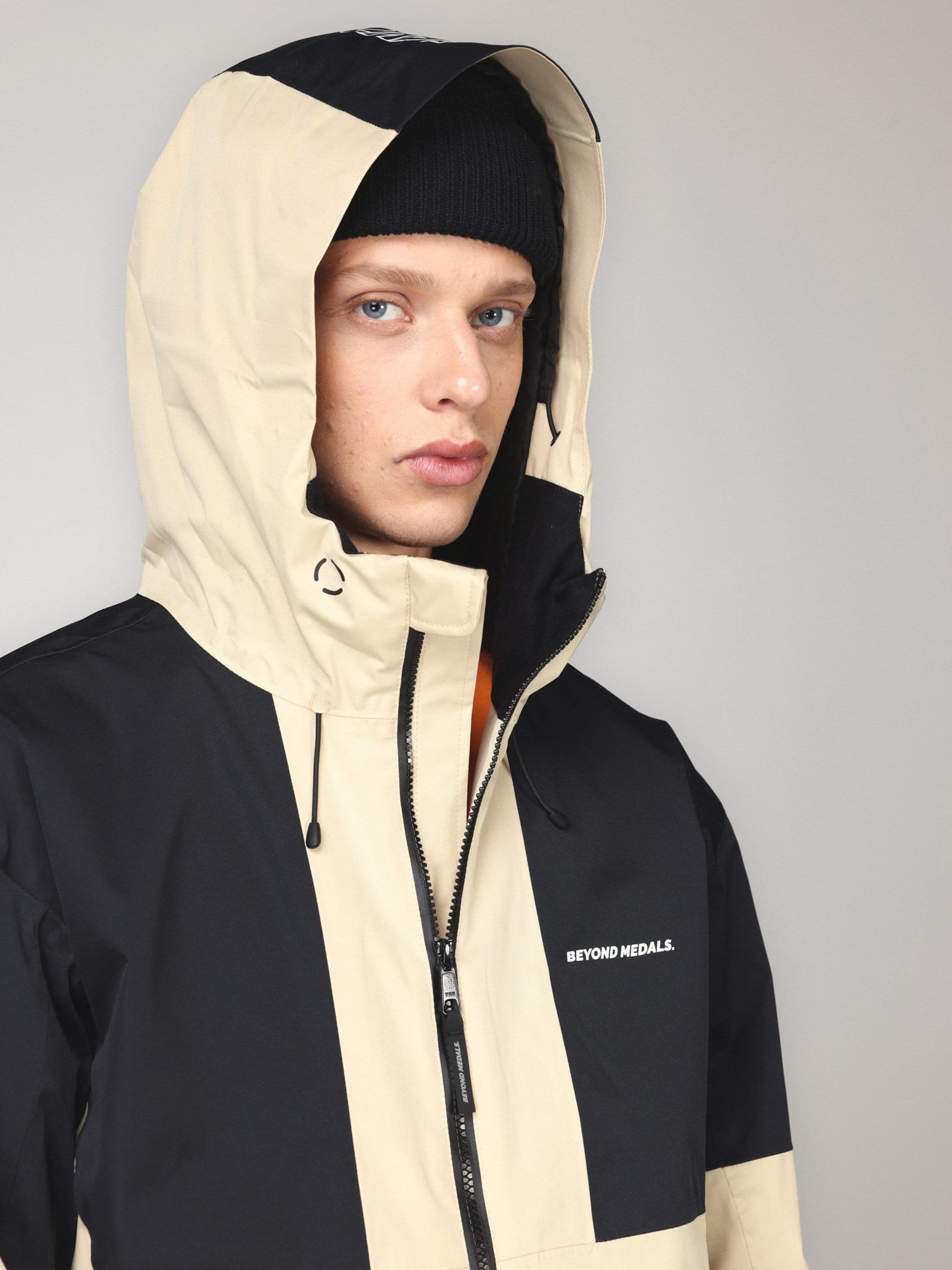 Waterproof jacket, Full Zip Jkt in green worn by model, Beyond Medals, 2024