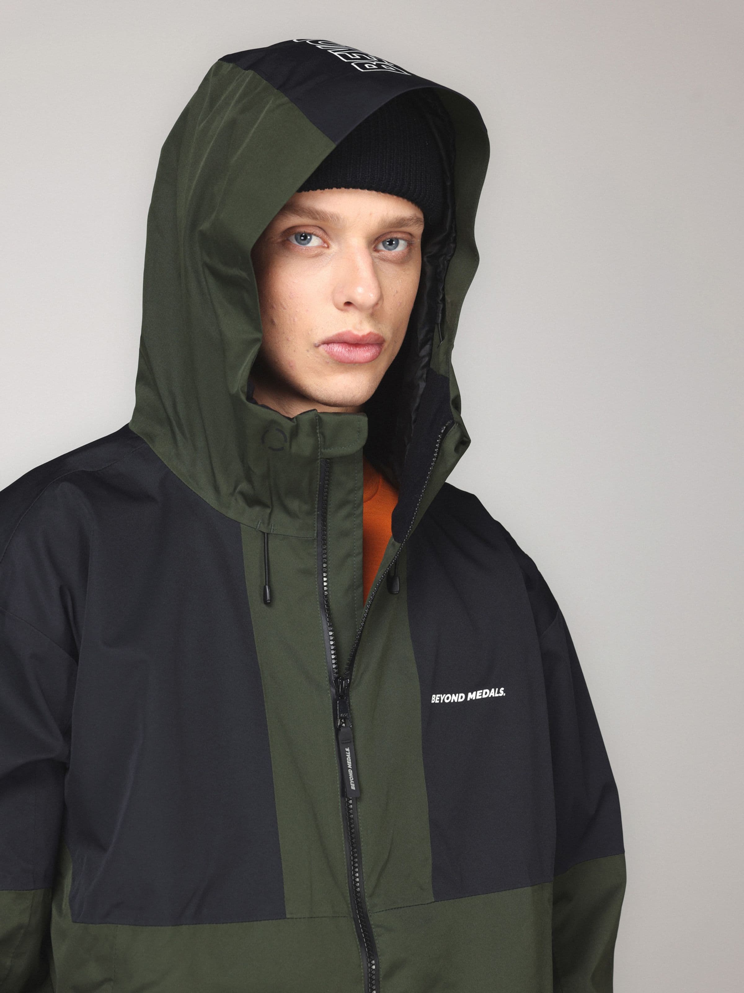 Waterproof snow jacket, Full Zip Jkt in green worn by model, Beyond Medals, 2024
