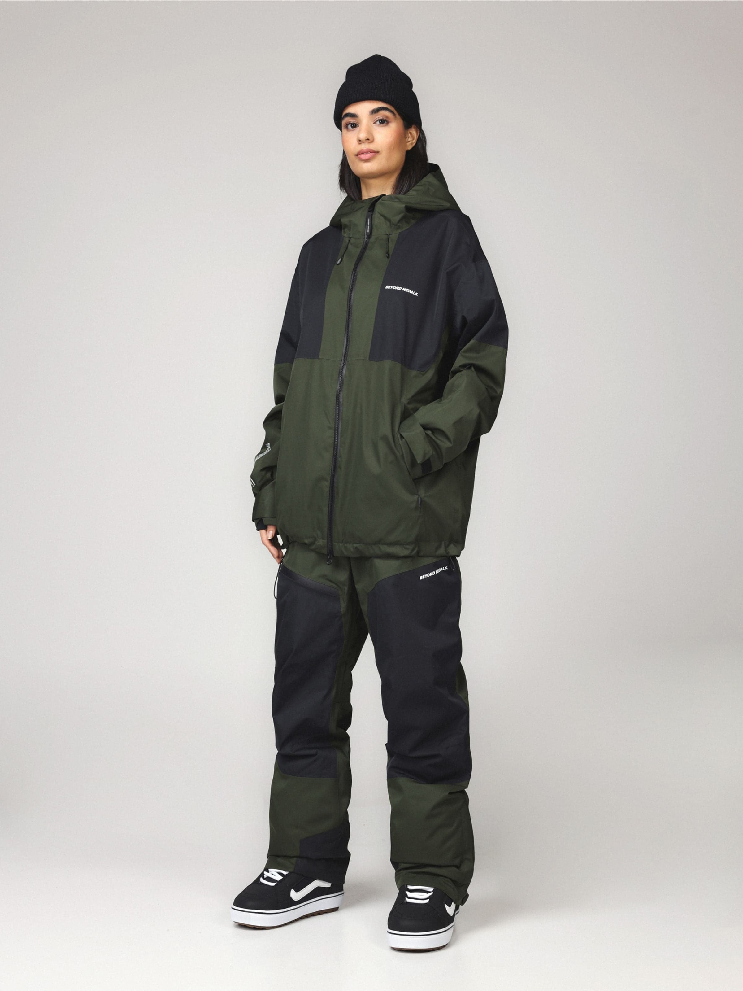 Outwear apparel, Full Zip Jkt in green worn by model, Beyond Medals, 2024