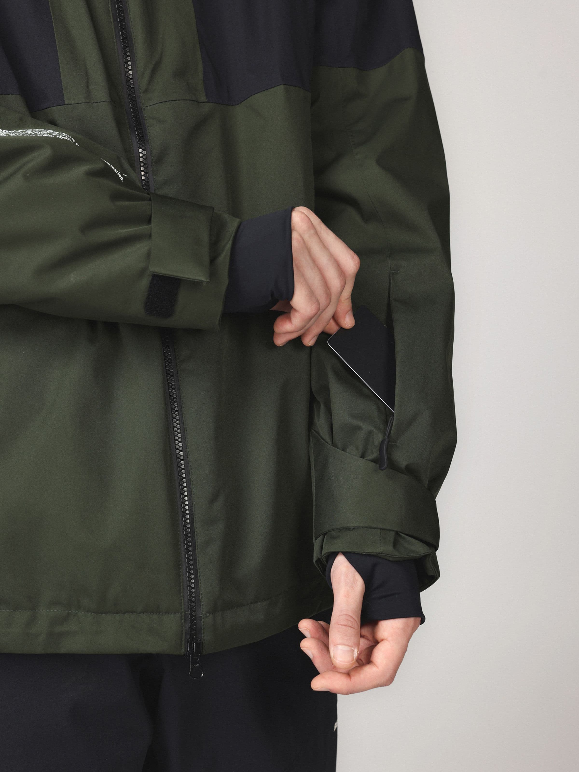 Waterproof snow jacket, Full Zip Jkt in green worn by model, Beyond Medals, 2024