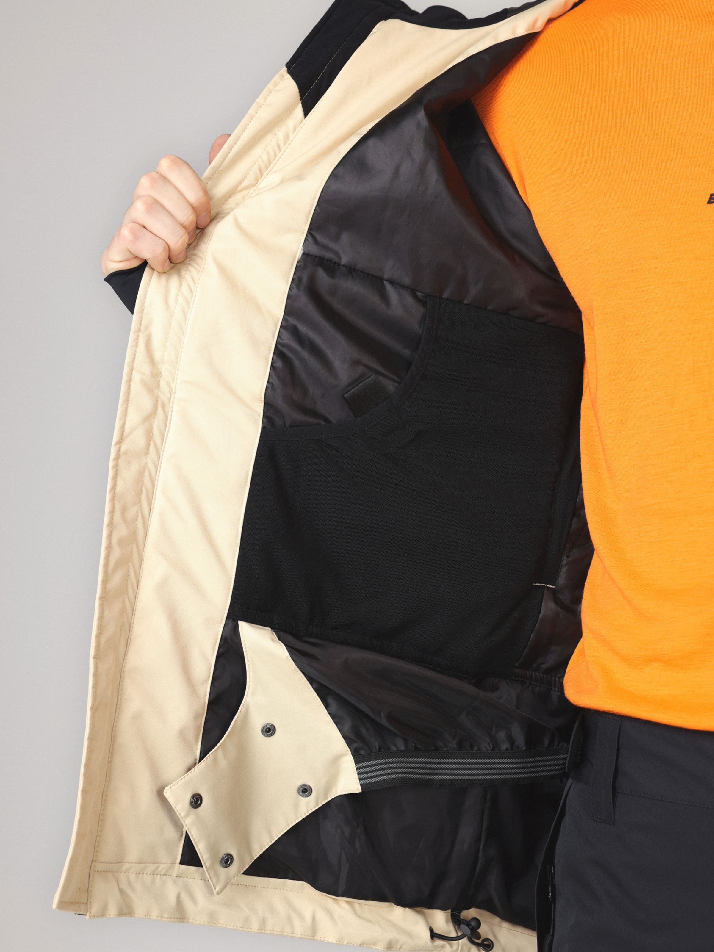 Waterproof jacket, Full Zip Jkt in green worn by model, Beyond Medals, 2024