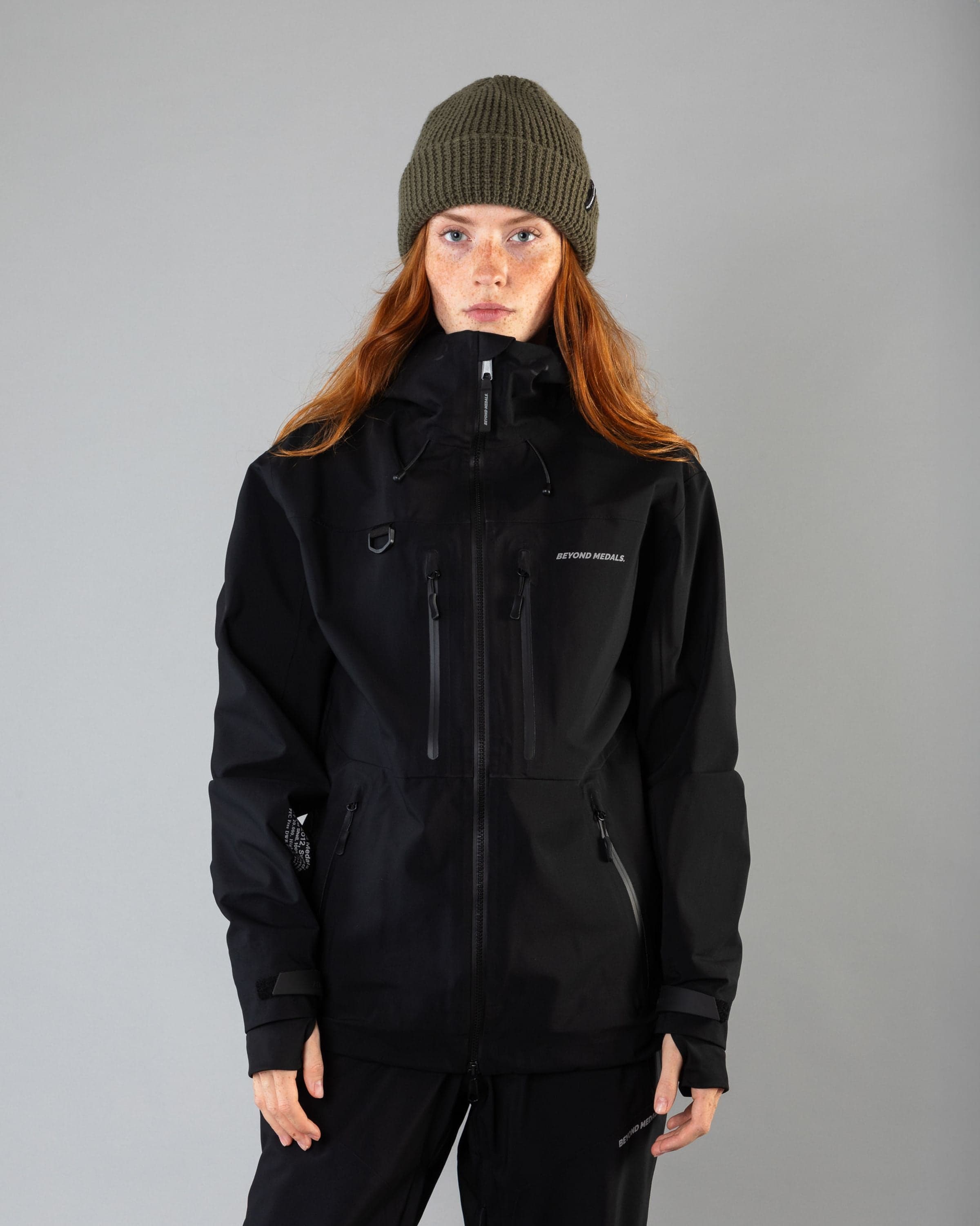 Outerwear clothing, pro tech jacket 3l in black worn by model, Beyond Medals, 2024, front