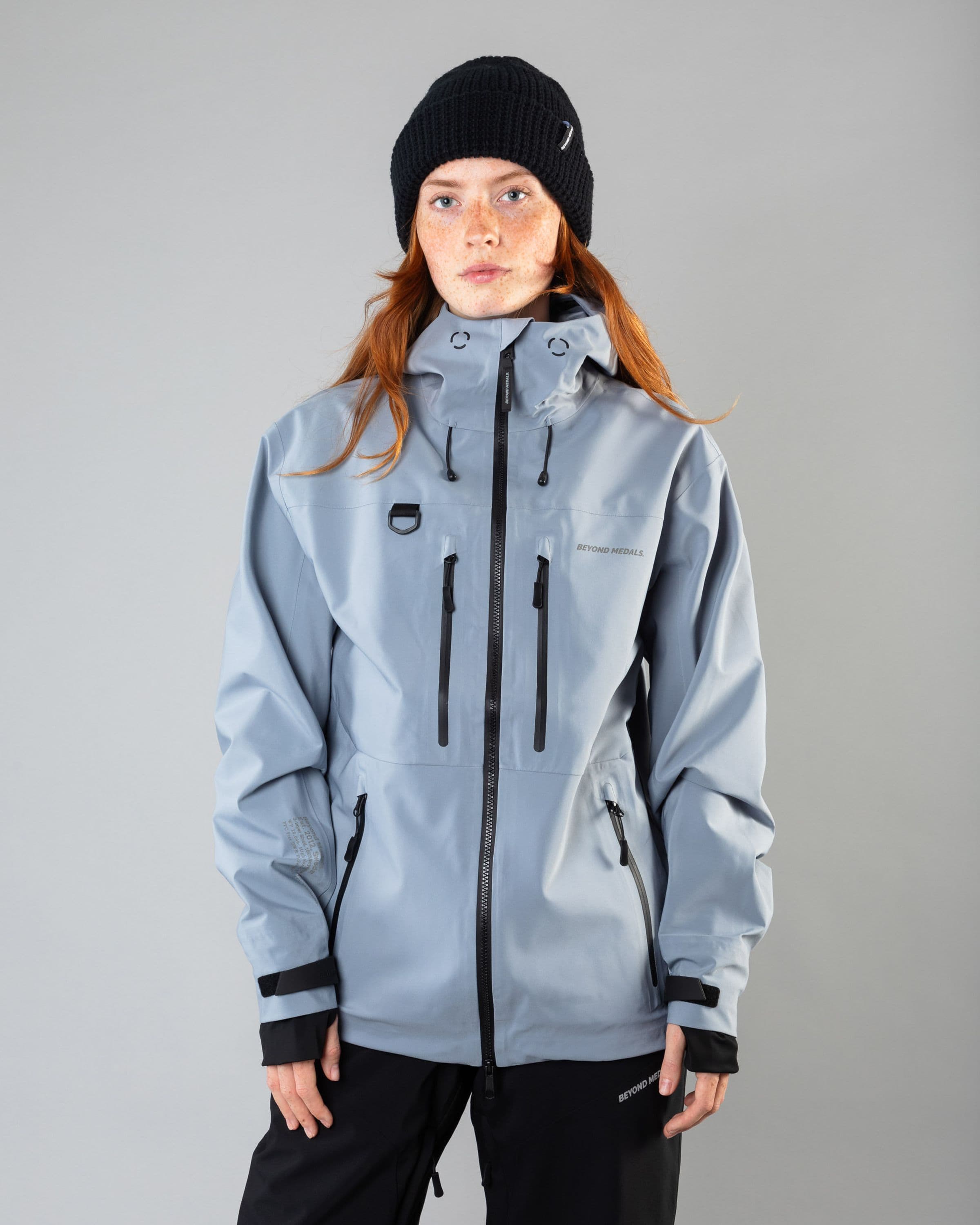 Outerwear clothing, pro tech jacket 3l in pale blue worn by model, Beyond Medals, 2024, front