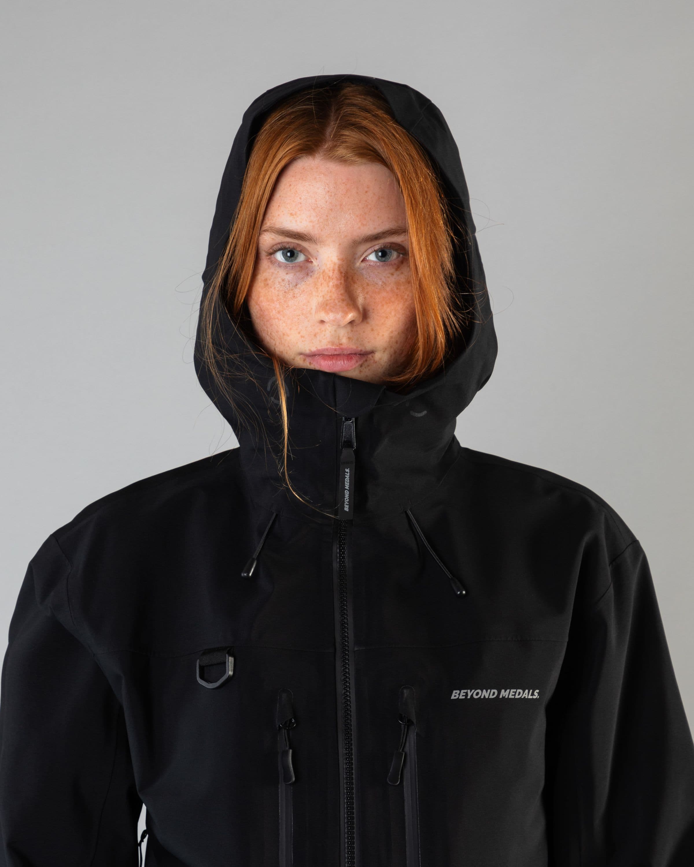 Outerwear clothing, pro tech jacket 3l in black worn by model, Beyond Medals, 2024, detail1