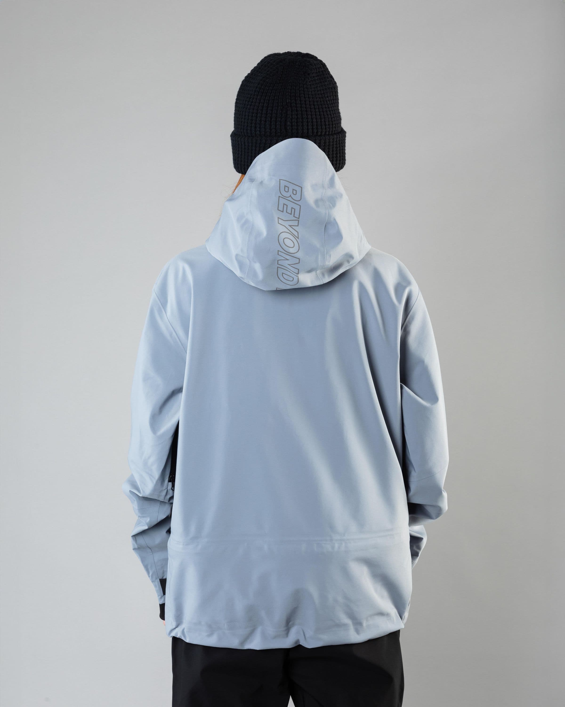 Outerwear clothing, pro tech jacket 3l in pale blue worn by model, Beyond Medals, 2024, back