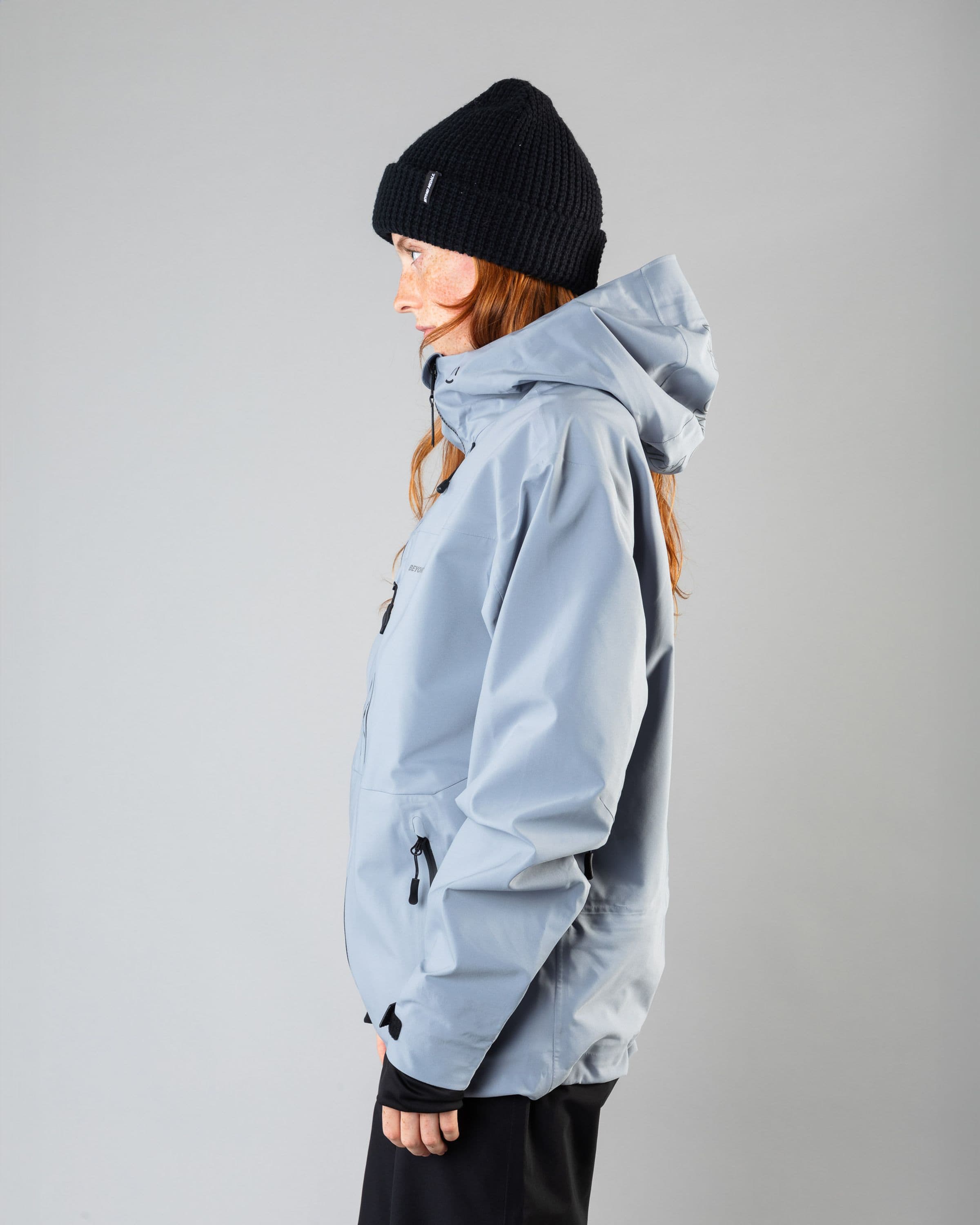 Outerwear clothing, pro tech jacket 3l in pale blue worn by model, Beyond Medals, 2024, side