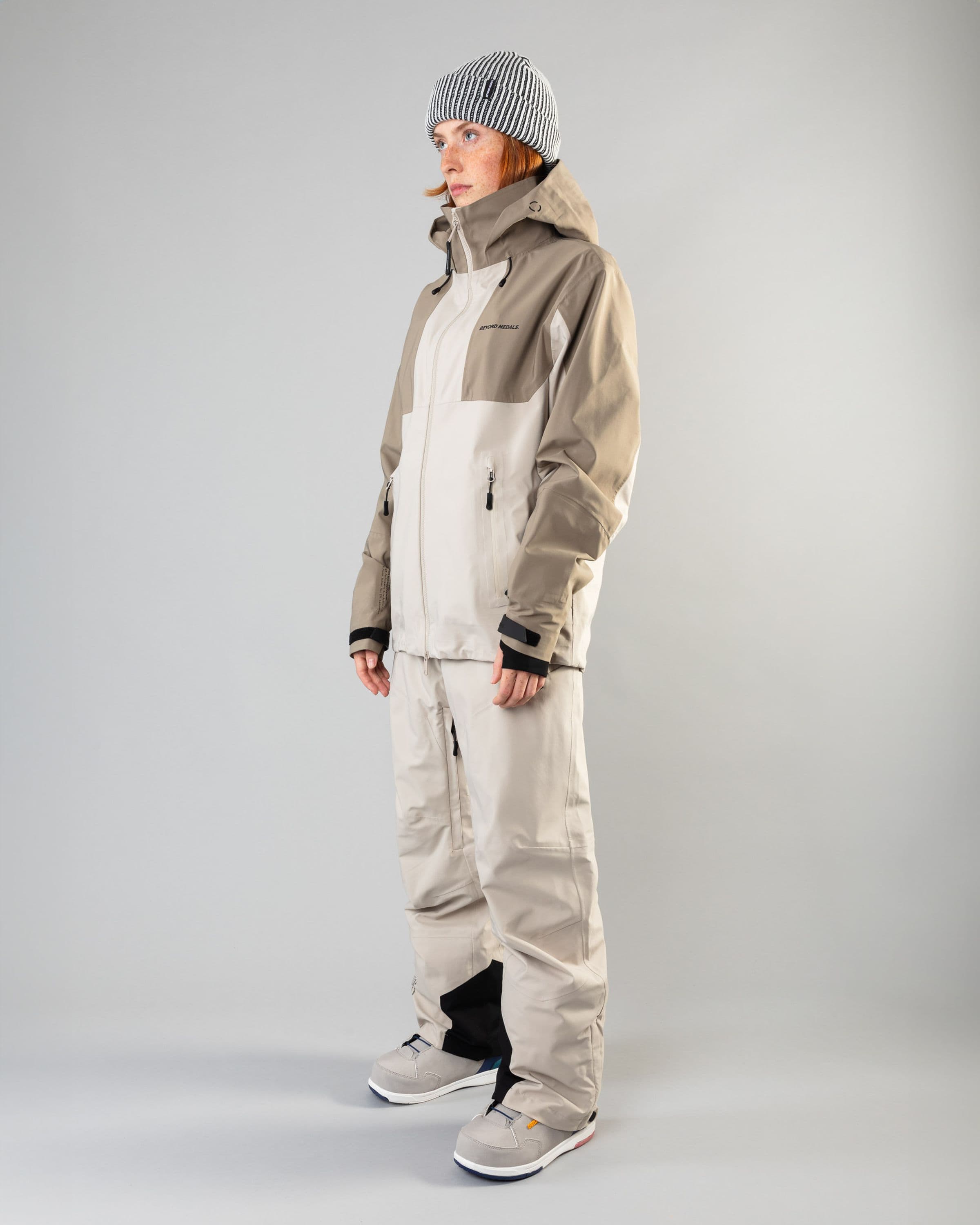 Outerwear clothing, tech jacket 3l in lt.beige worn by model, Beyond Medals, 2024, full front 2