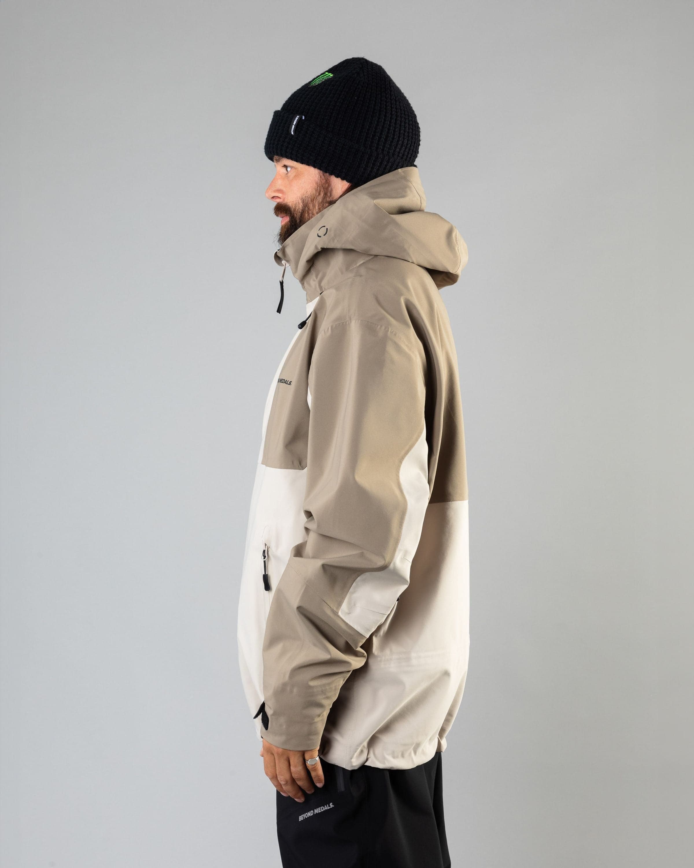 Outerwear clothing, tech jacket 3l in lt.beige worn by ULRIK BADERTSCHER, Beyond Medals, 2024, side