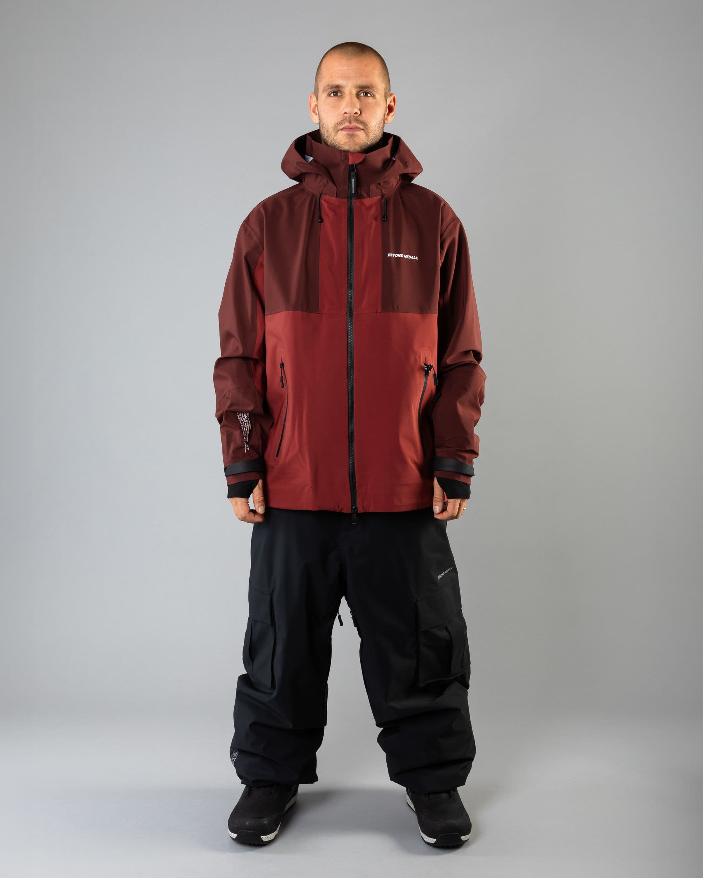 Outerwear clothing, tech jacket 3l in red worn by TOR LUNDSTRÖM, Beyond Medals, 2024, full front