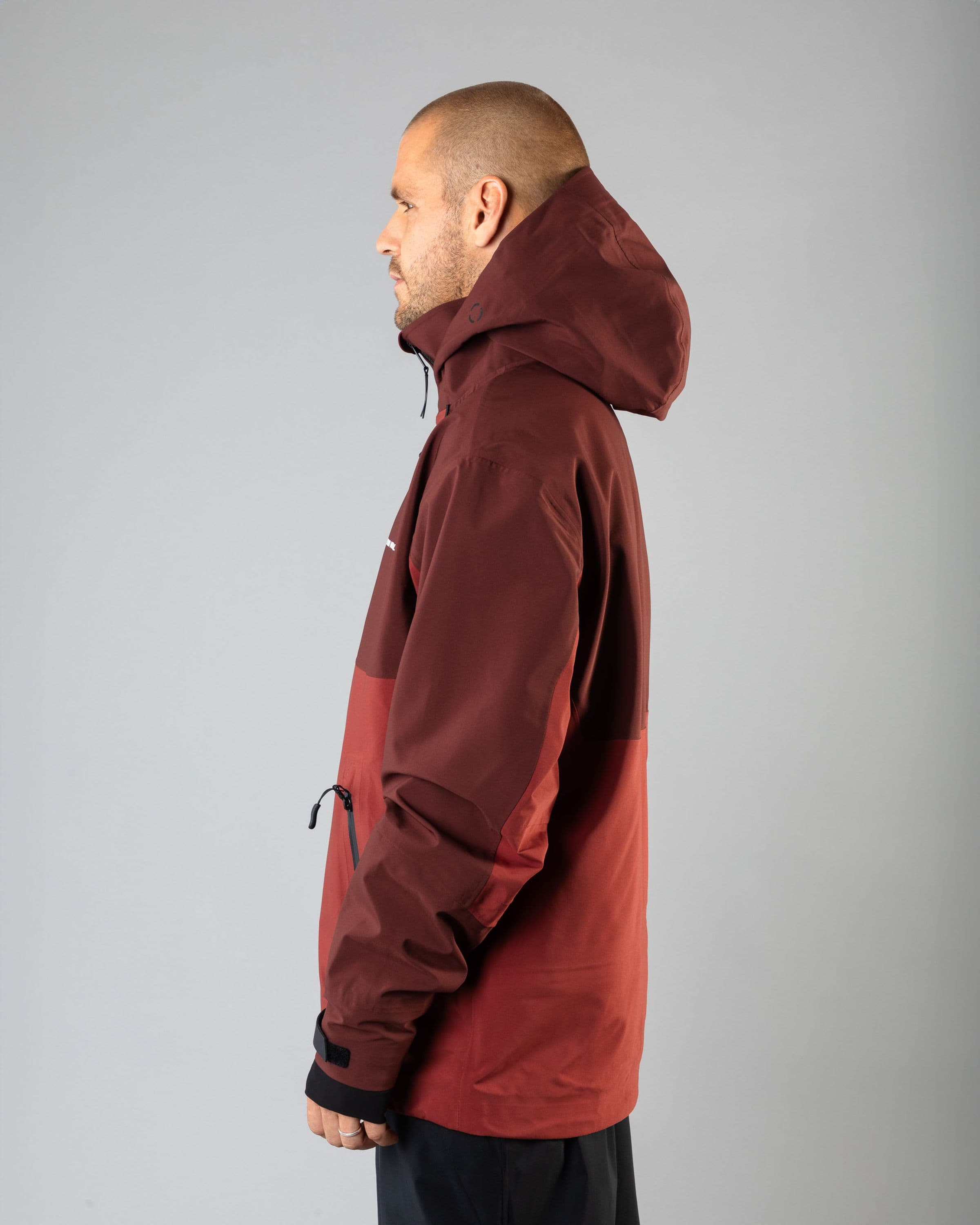 Outerwear clothing, tech jacket 3l in red worn by TOR LUNDSTRÖM, Beyond Medals, 2024, side