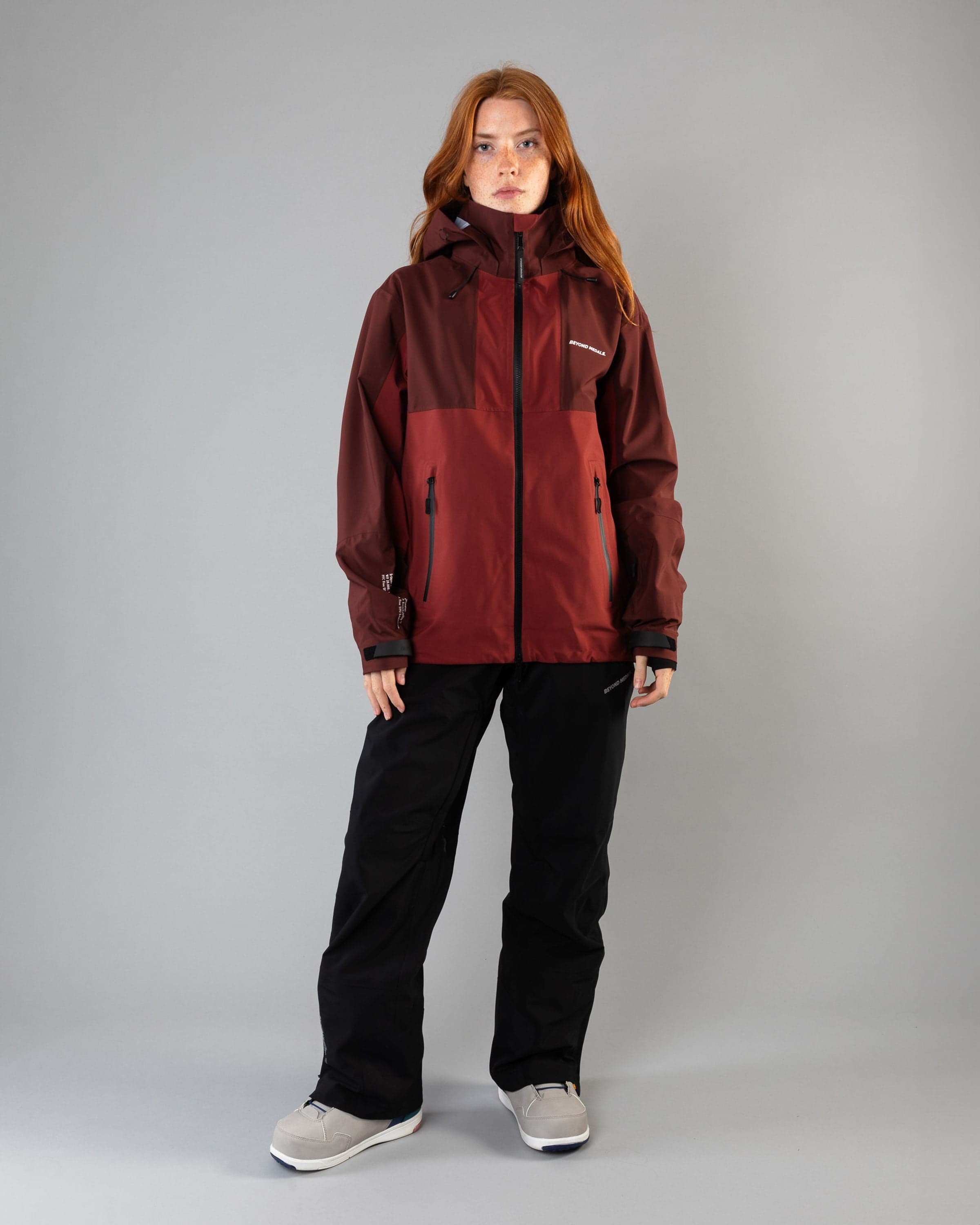 Outerwear clothing, tech jacket 3l in red worn by model, Beyond Medals, 2024, full front