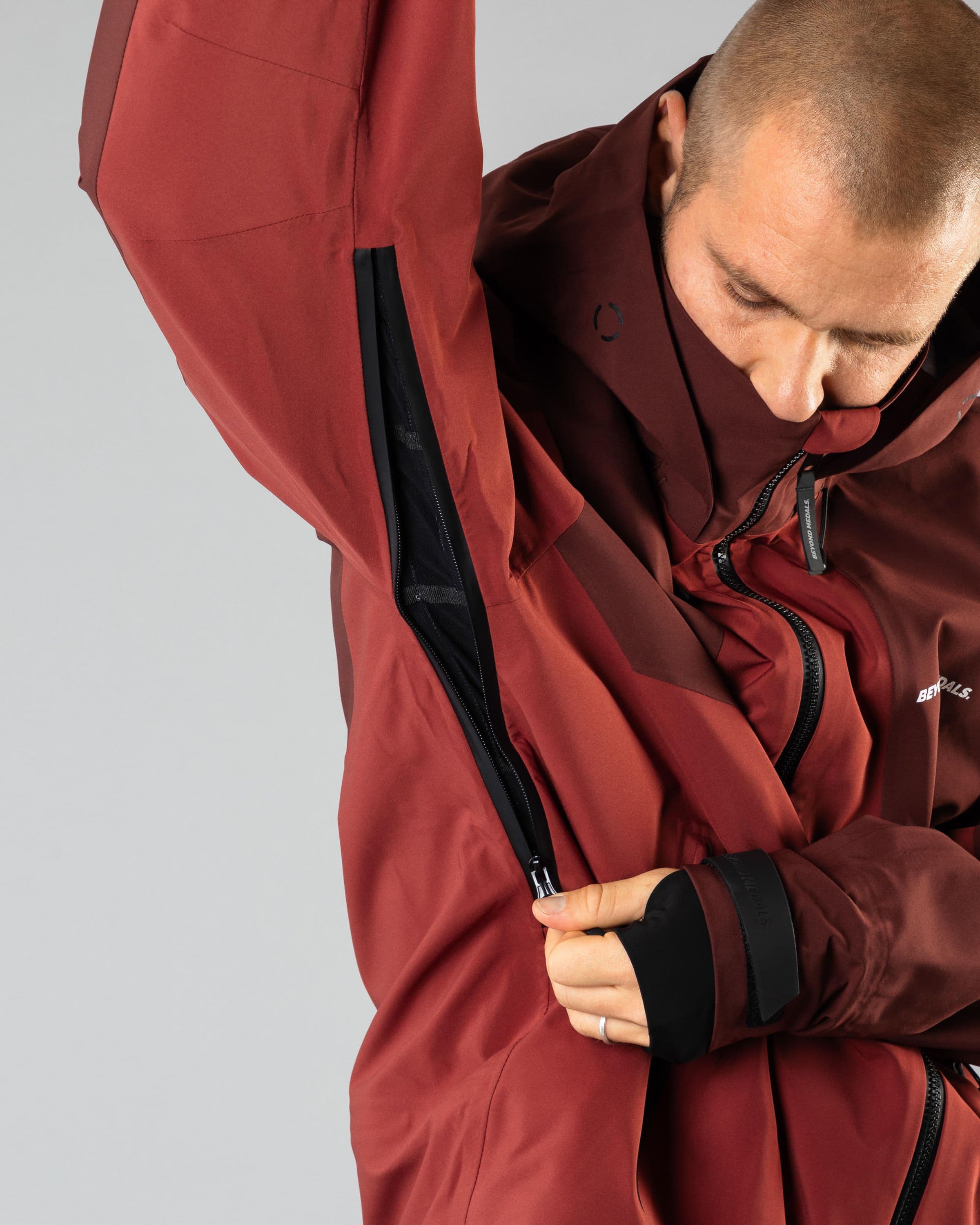 Outerwear clothing, tech jacket 3l in red worn by TOR LUNDSTRÖM, Beyond Medals, 2024, detail3