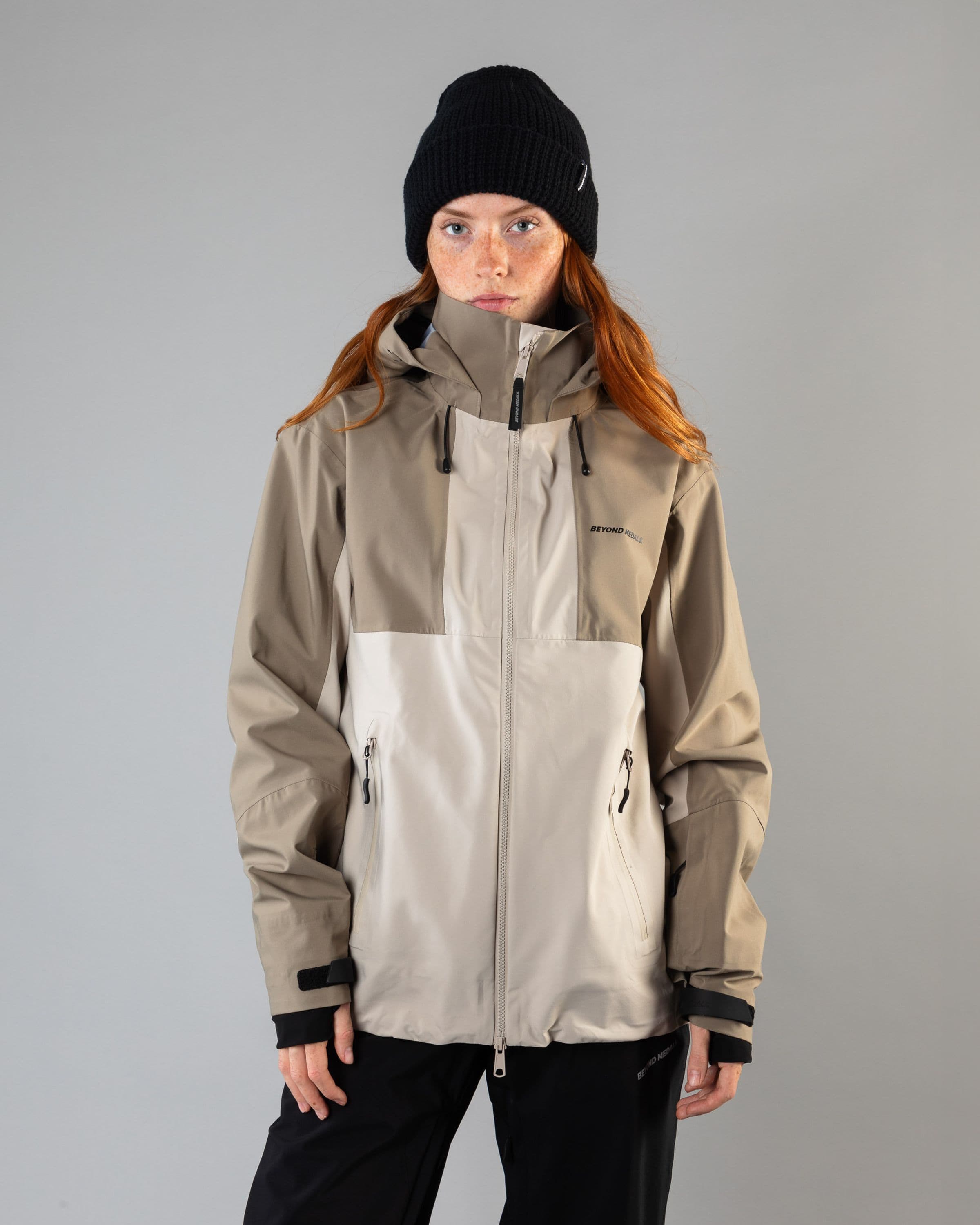 Outerwear clothing, tech jacket 3l in lt.beige worn by model, Beyond Medals, 2024, front
