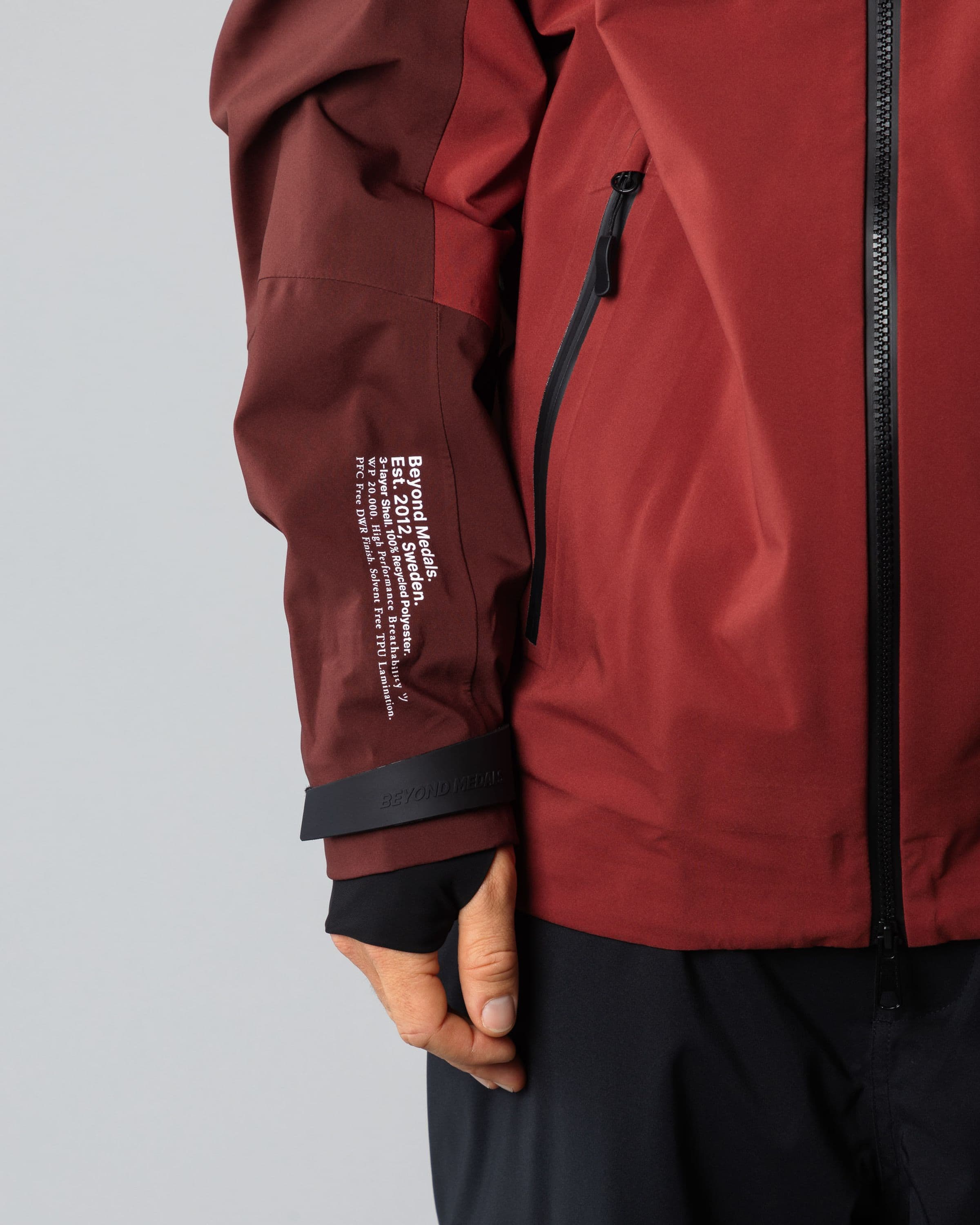 Outerwear clothing, tech jacket 3l in red worn by TOR LUNDSTRÖM, Beyond Medals, 2024,detail8