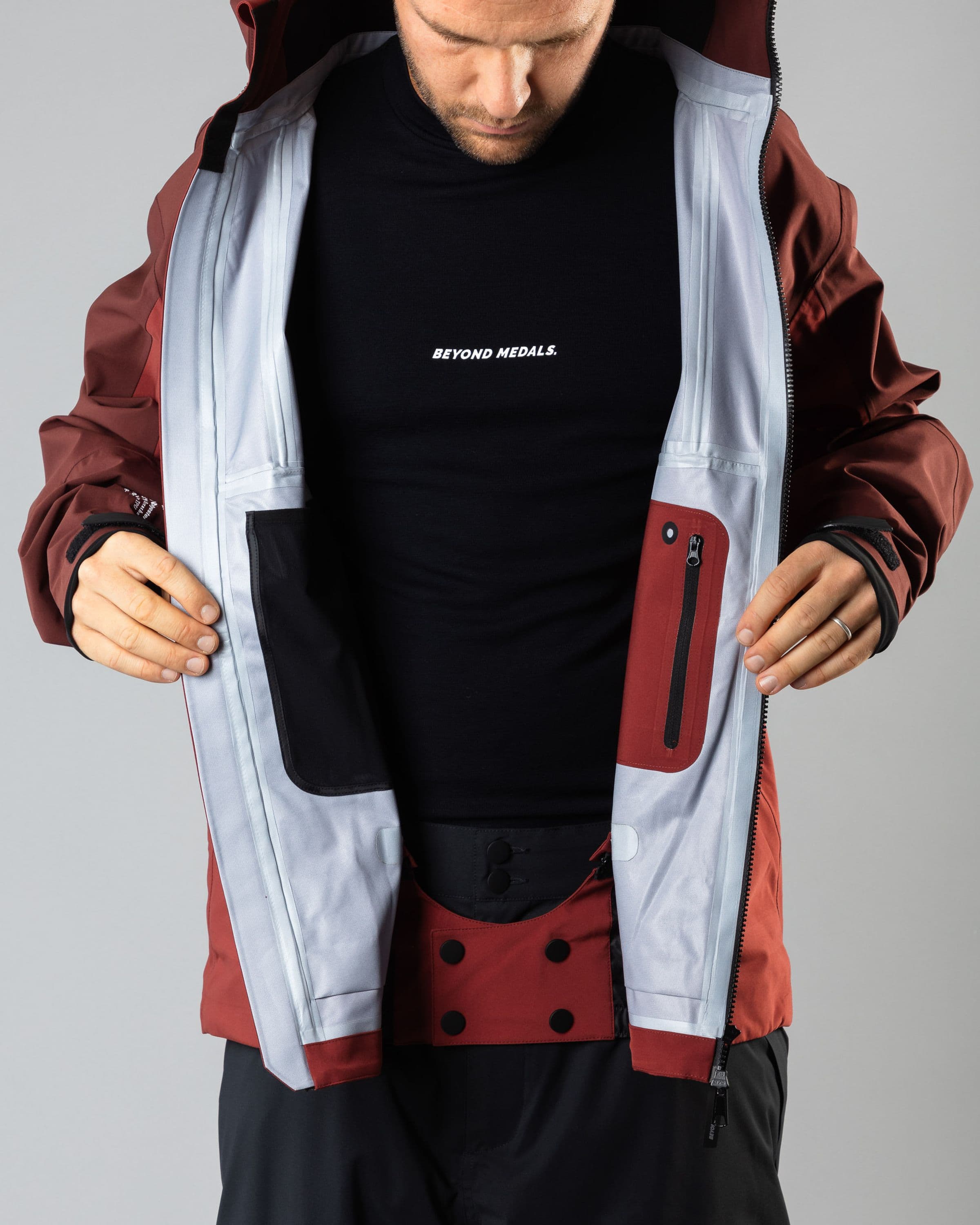 Outerwear clothing, tech jacket 3l in red worn by TOR LUNDSTRÖM, Beyond Medals, 2024, detail4