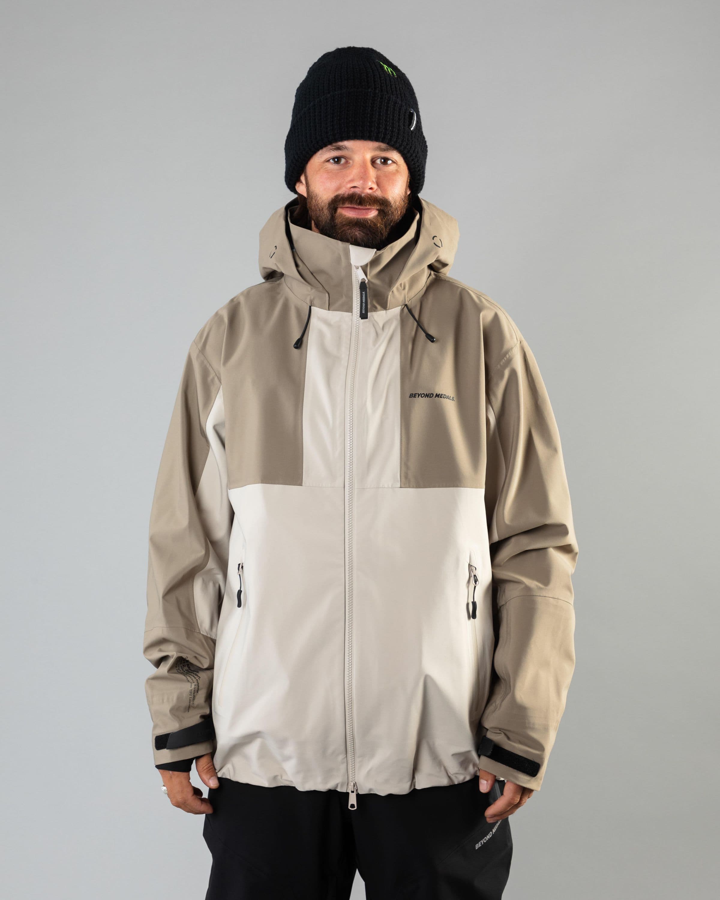 Outerwear clothing, tech jacket 3l in lt.beige worn by ULRIK BADERTSCHER, Beyond Medals, 2024, front