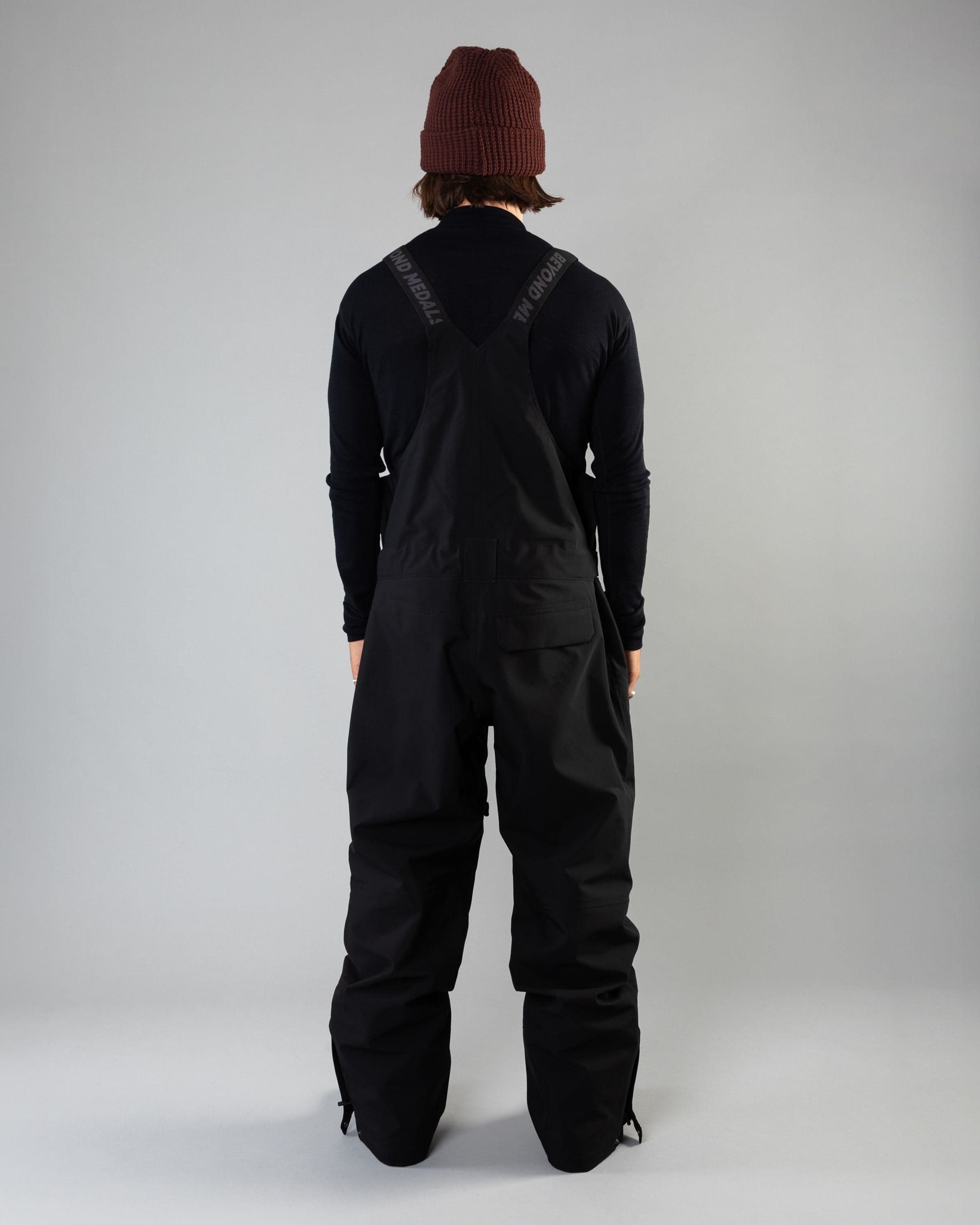 Outerwear clothing, tech bib 3l in black worn by ULRIK BADERTSCHER, Beyond Medals, 2024, back