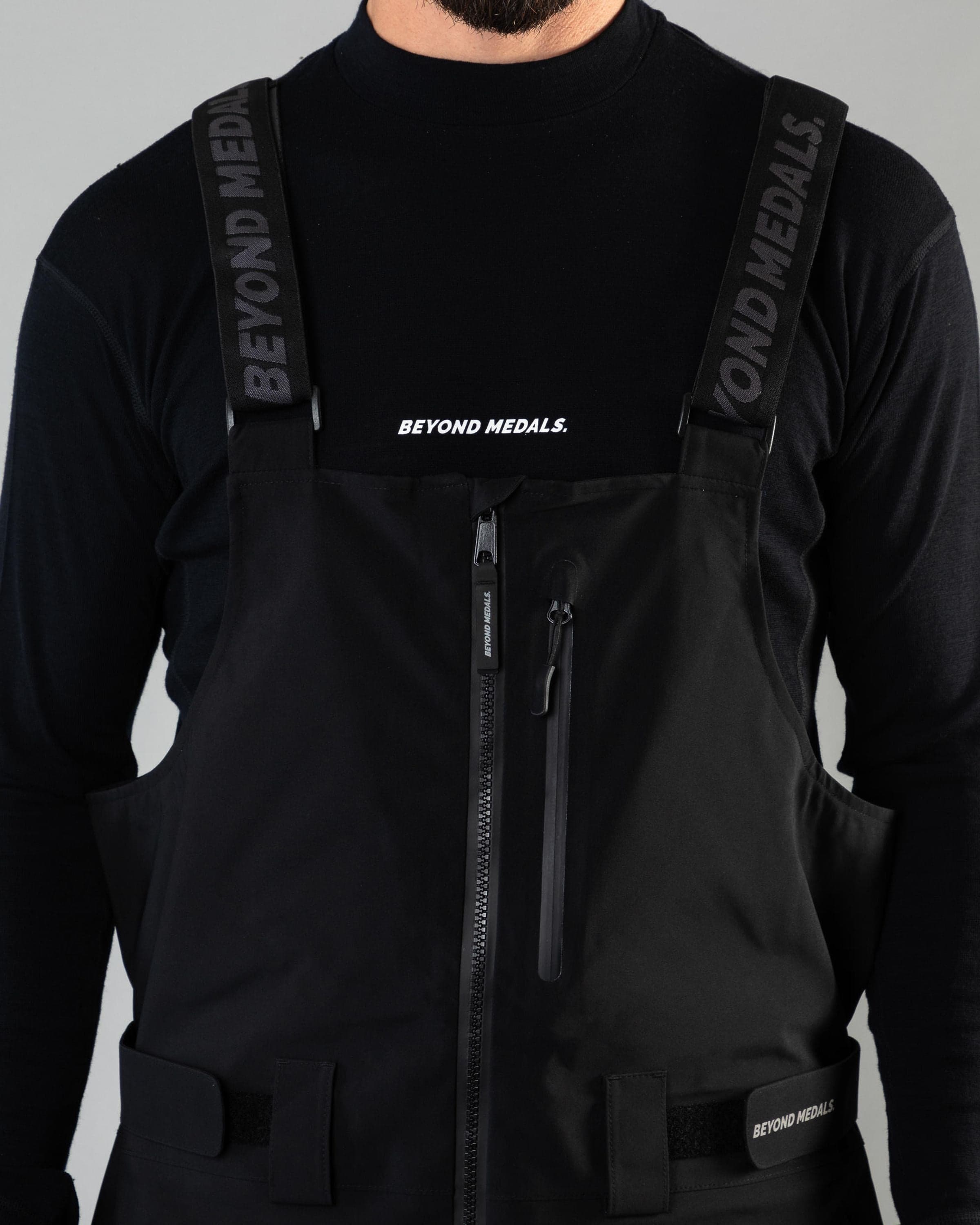 Outerwear clothing, tech bib 3l in black worn by ULRIK BADERTSCHER, Beyond Medals, 2024, detail1