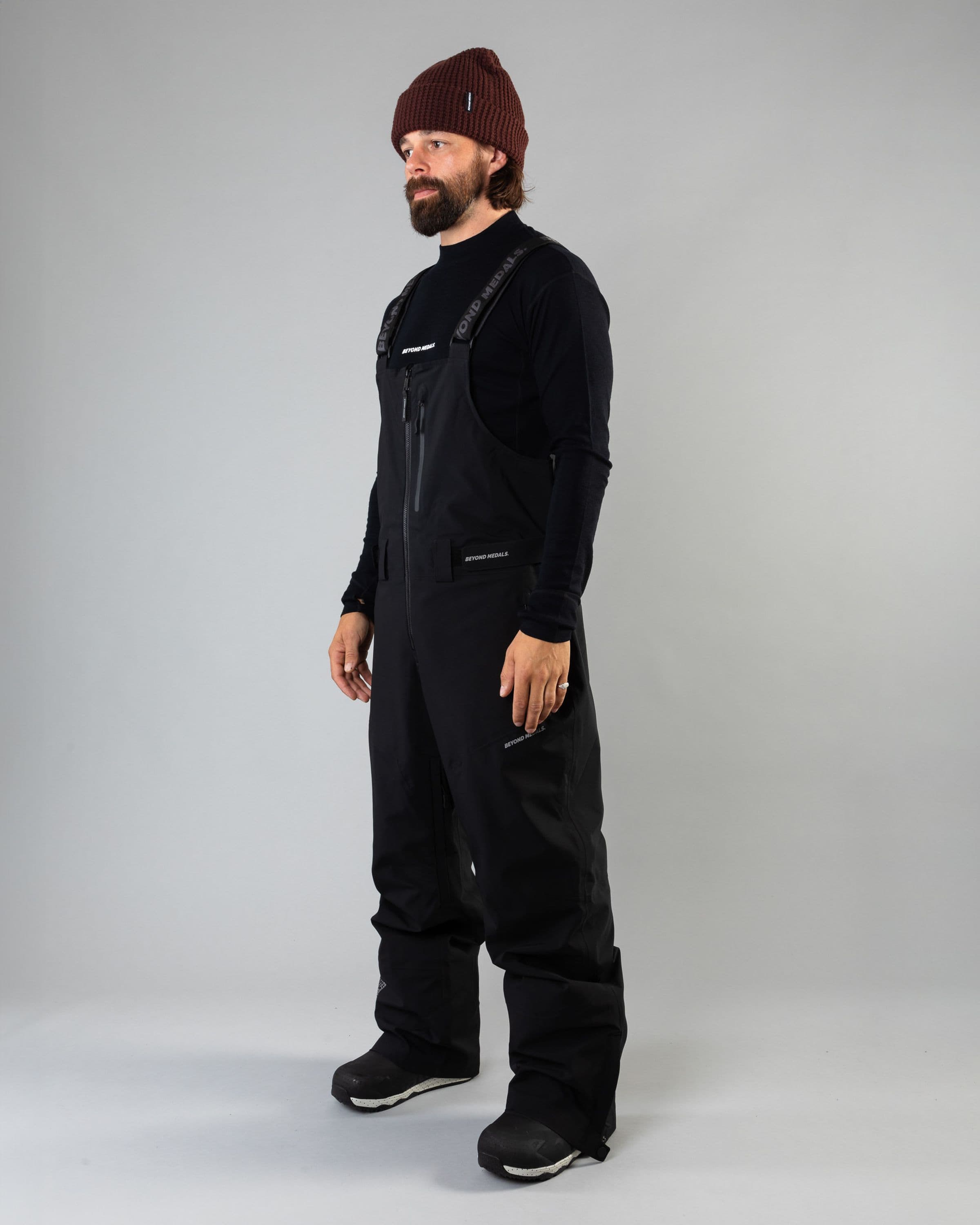 Outerwear clothing, tech bib 3l in black worn by ULRIK BADERTSCHER, Beyond Medals, 2024, front