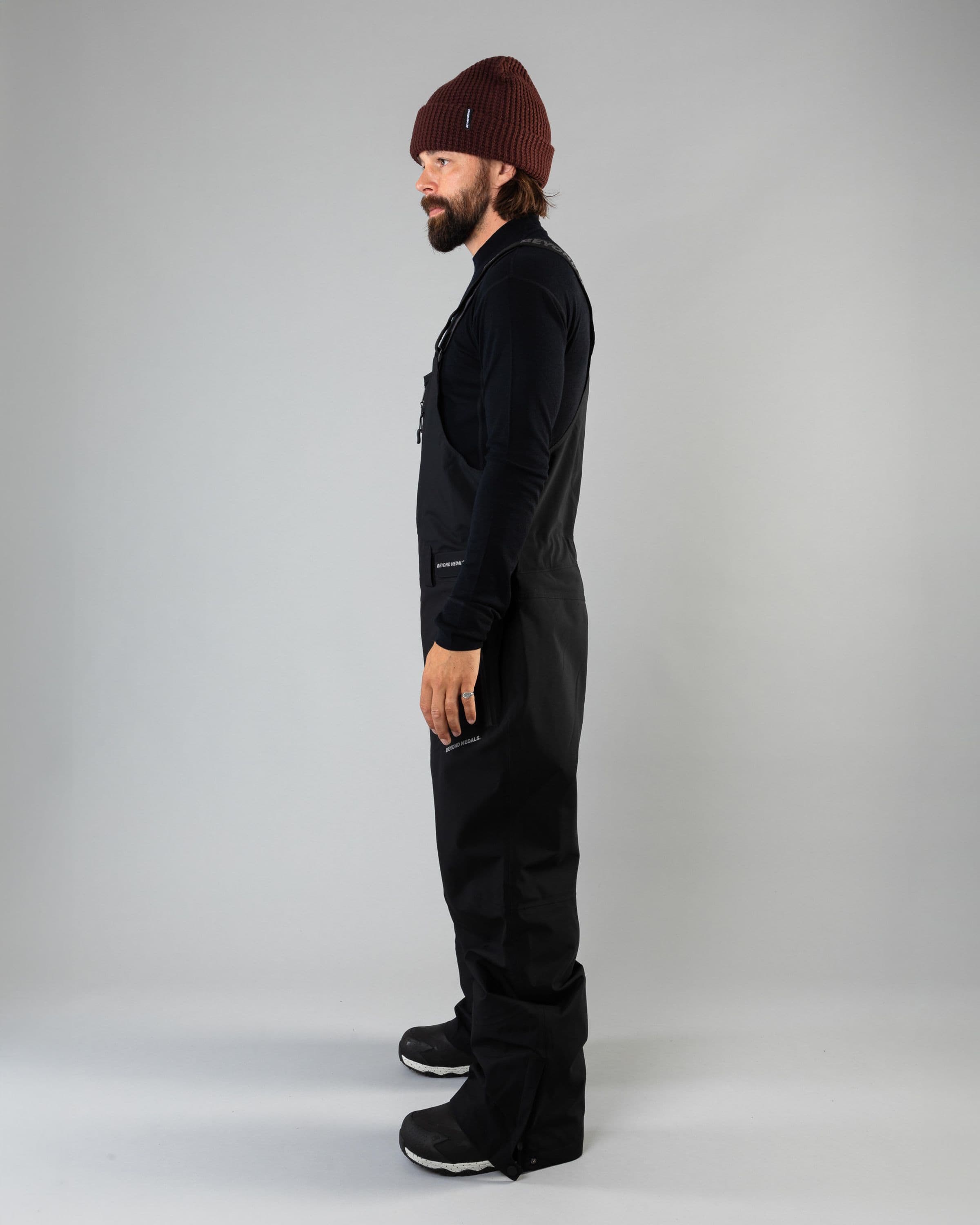 Outerwear clothing, tech bib 3l in black worn by ULRIK BADERTSCHER, Beyond Medals, 2024, side