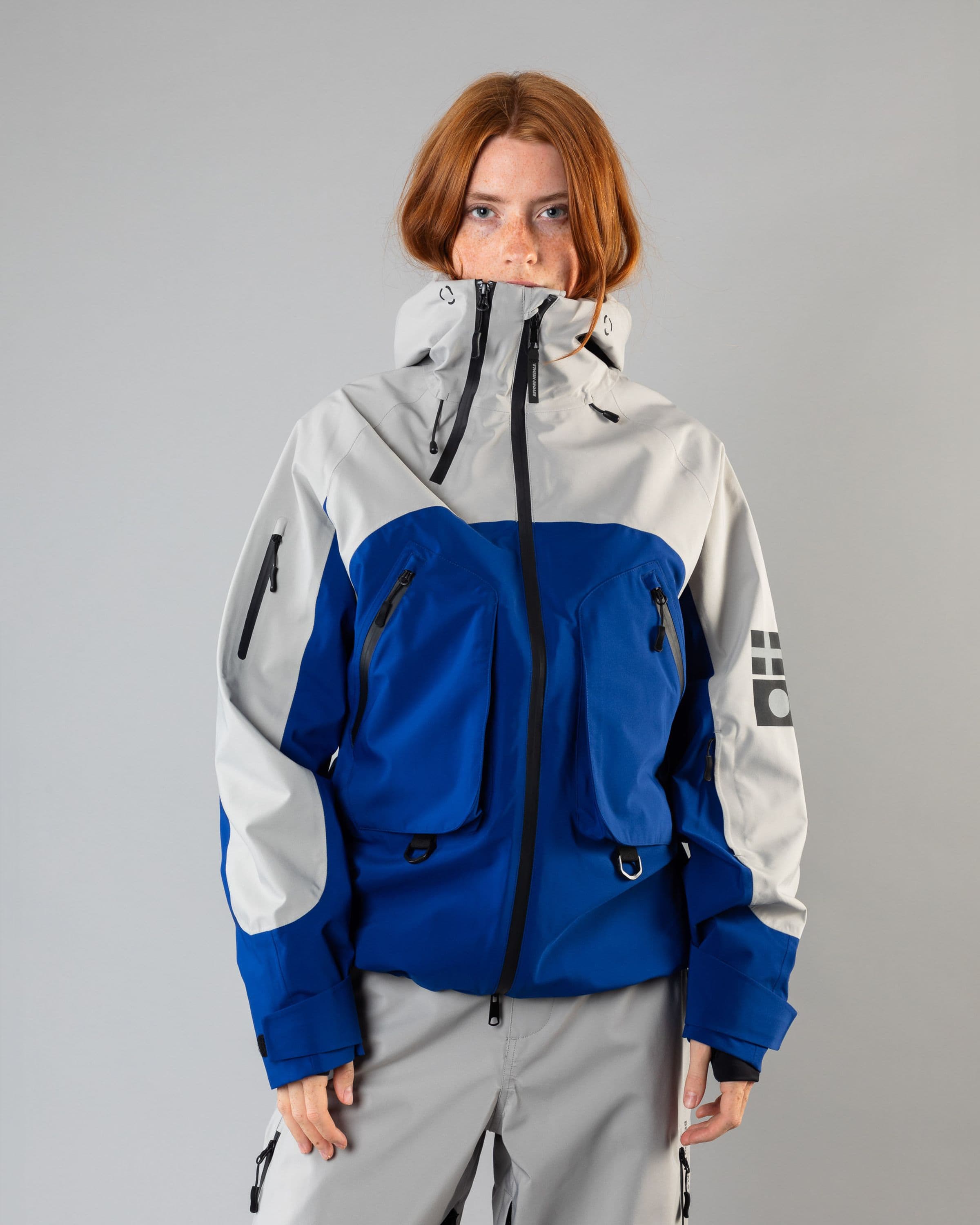 Outerwear clothing, beyond medals x nomadik jacket 3l in blue worn by model, Beyond Medals, 2024, front