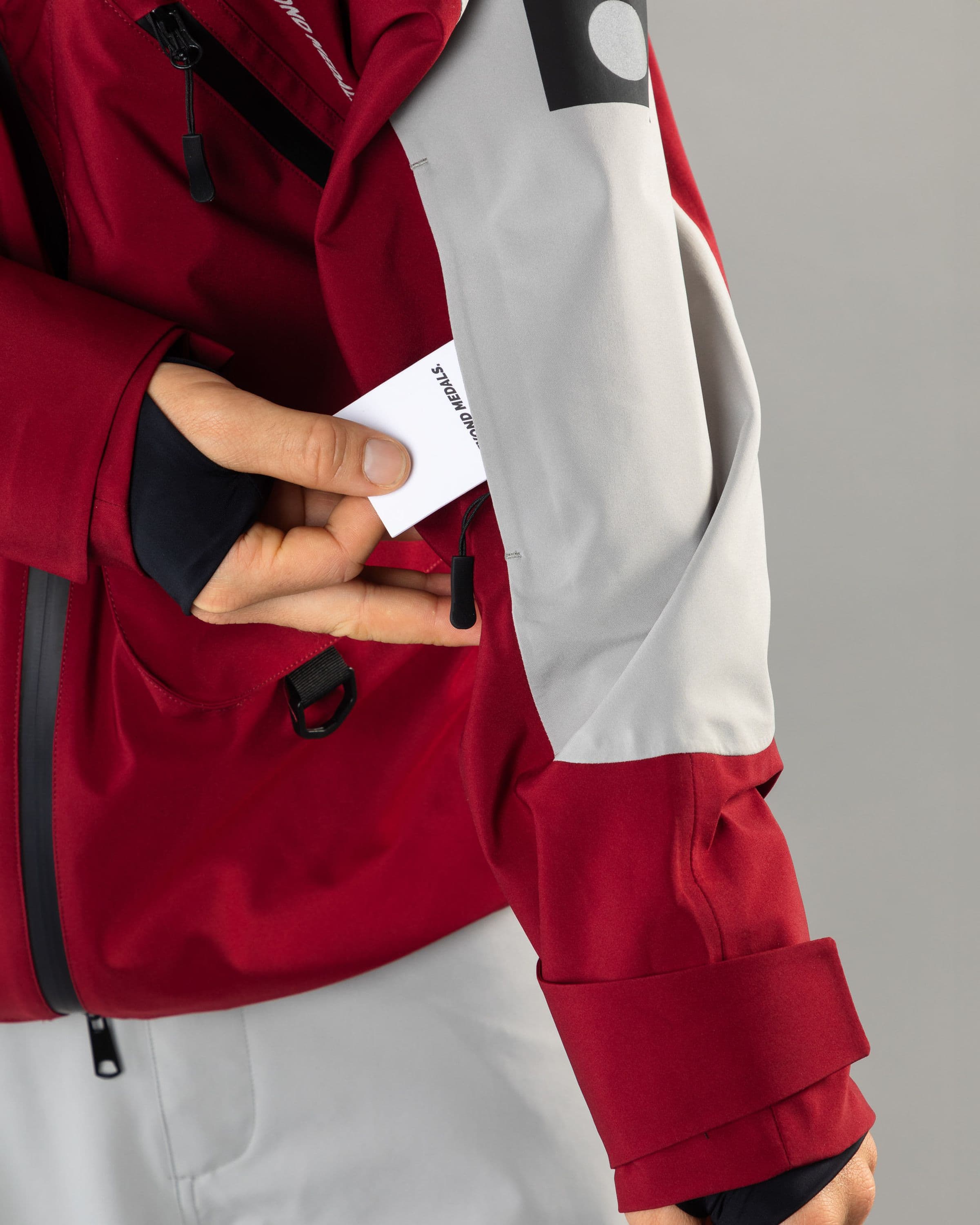 Outerwear clothing, beyond medals x nomadik jacket 3l in red worn by TOR LUNDSTRÖM, Beyond Medals, 2024, detail4