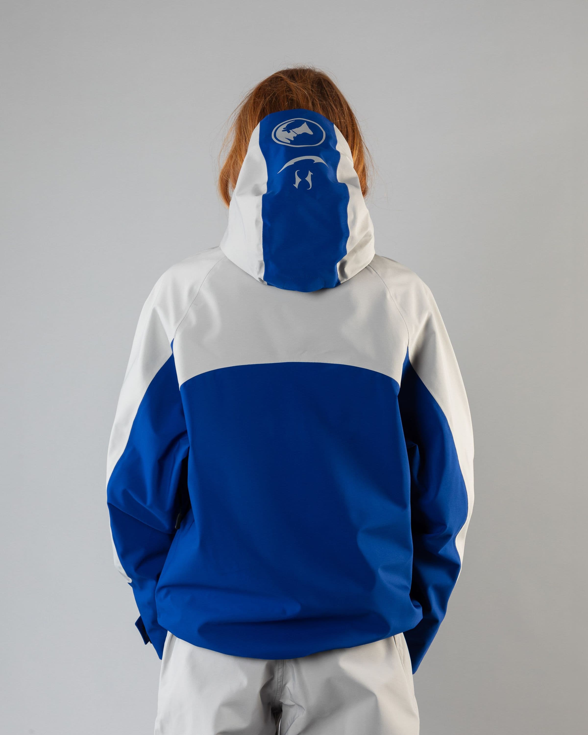 Outerwear clothing, beyond medals x nomadik jacket 3l in blue worn by model, Beyond Medals, 2024, back