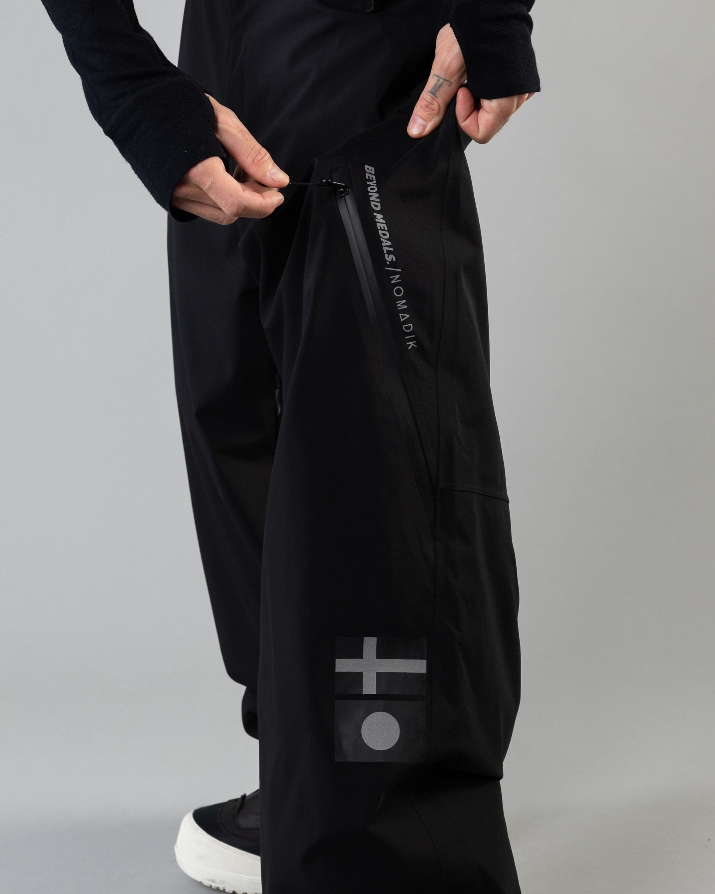 Outerwear clothing, beyond medals x nomadik pants 3l in black worn by KEVIN BÄCKSTRÖM, Beyond Medals, 2024, detail4
