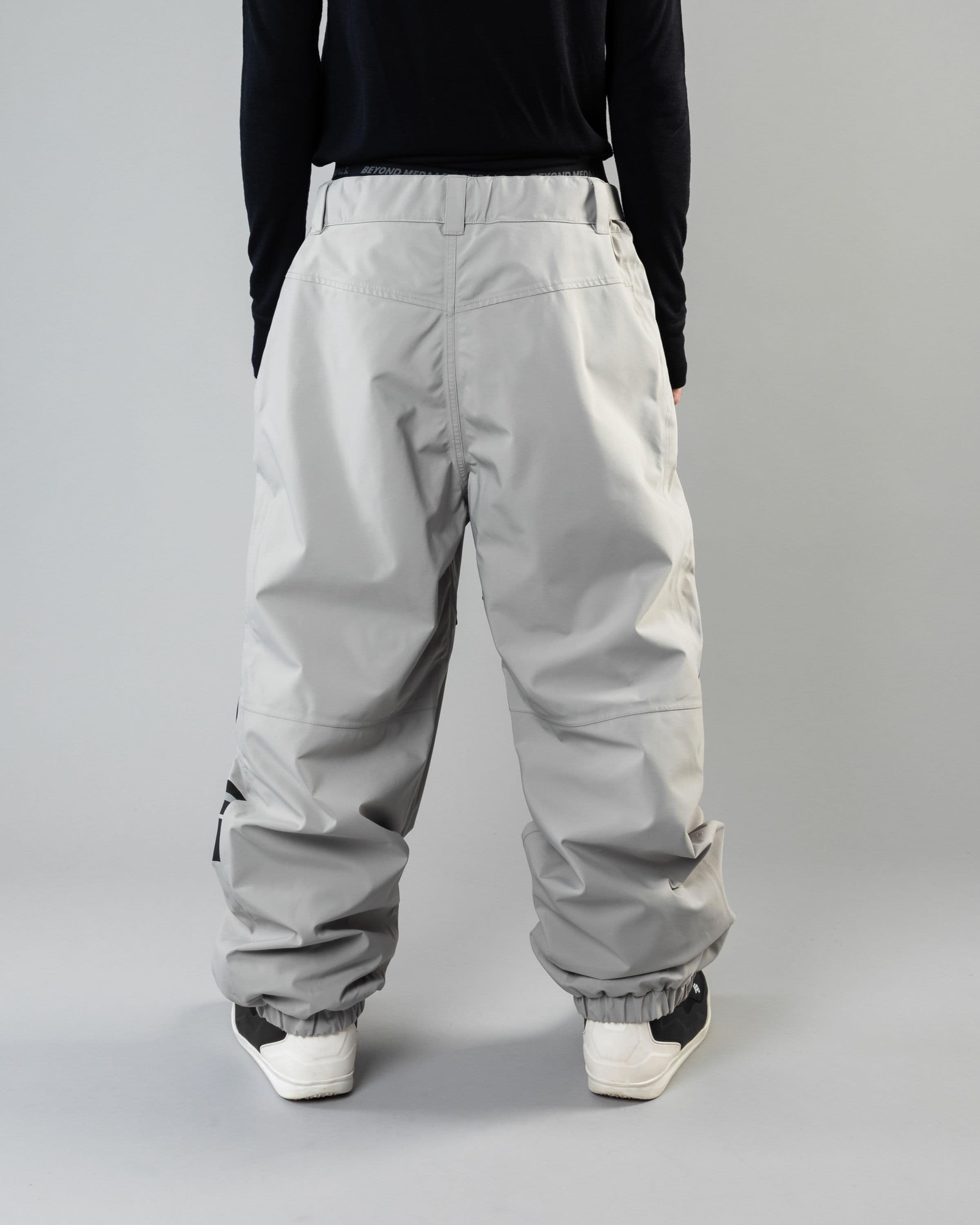 Outerwear clothing, beyond medals x nomadik pants 3l in grey worn by KEVIN BÄCKSTRÖM, Beyond Medals, 2024, back