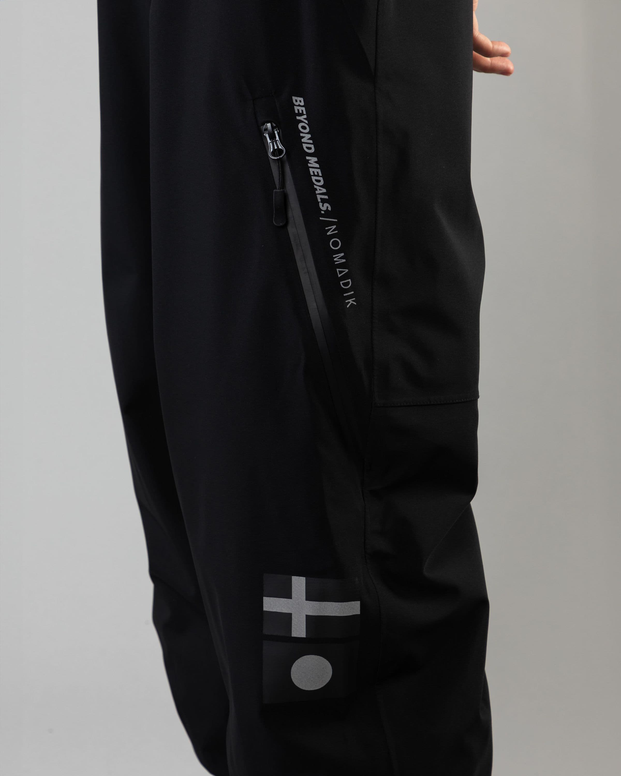 Outerwear clothing, beyond medals x nomadik pants 3l in black worn by KEVIN BÄCKSTRÖM, Beyond Medals, 2024, detail3