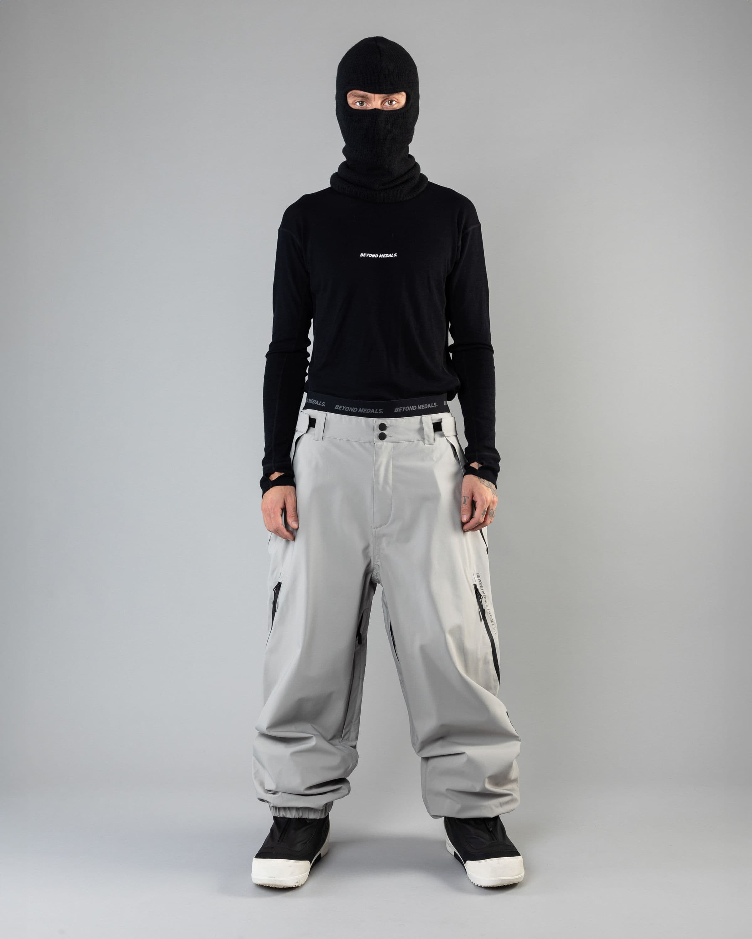 Outerwear clothing, beyond medals x nomadik pants 3l in grey worn by KEVIN BÄCKSTRÖM, Beyond Medals, 2024, full front