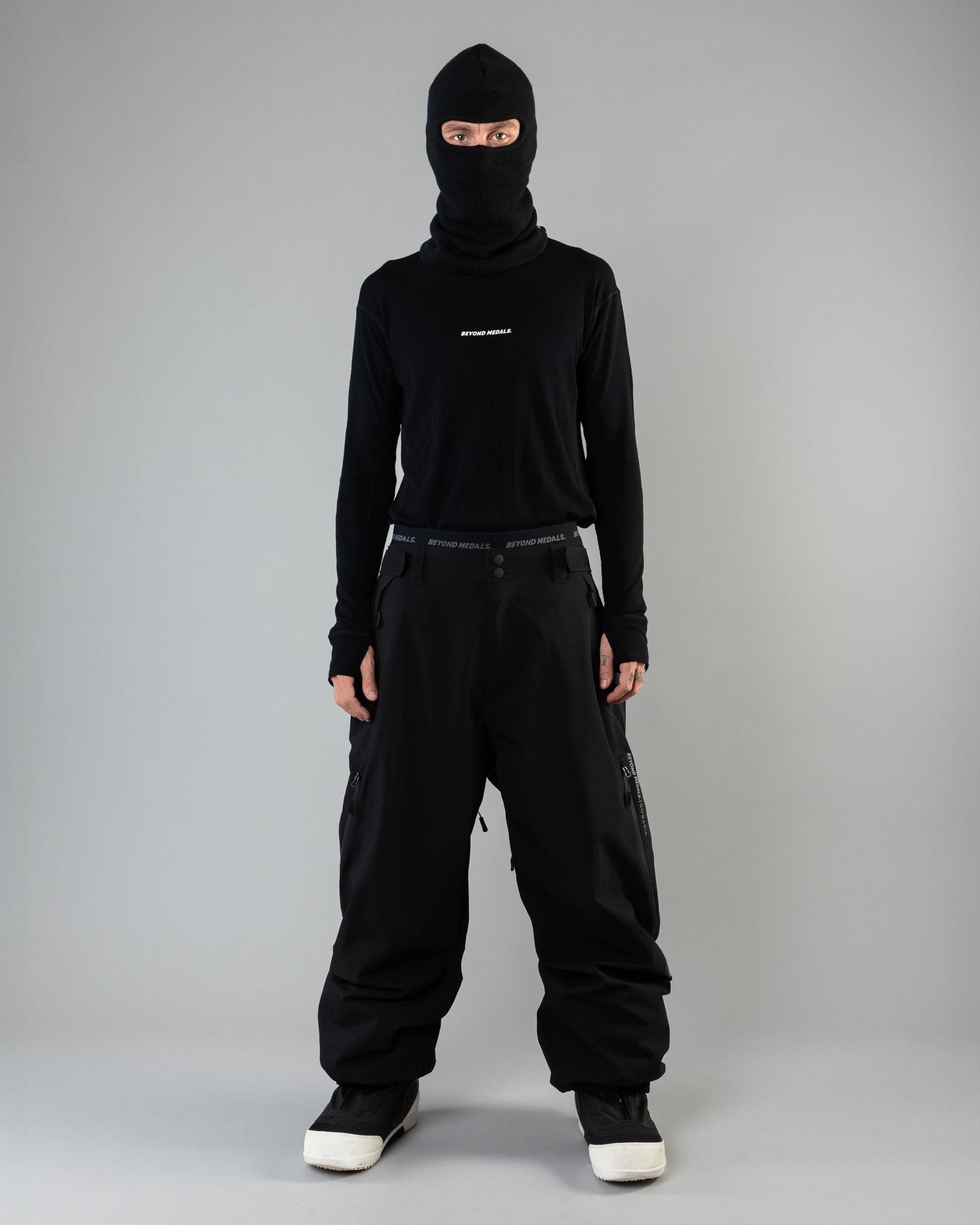Outerwear clothing, beyond medals x nomadik pants 3l in black worn by KEVIN BÄCKSTRÖM, Beyond Medals, 2024, full front