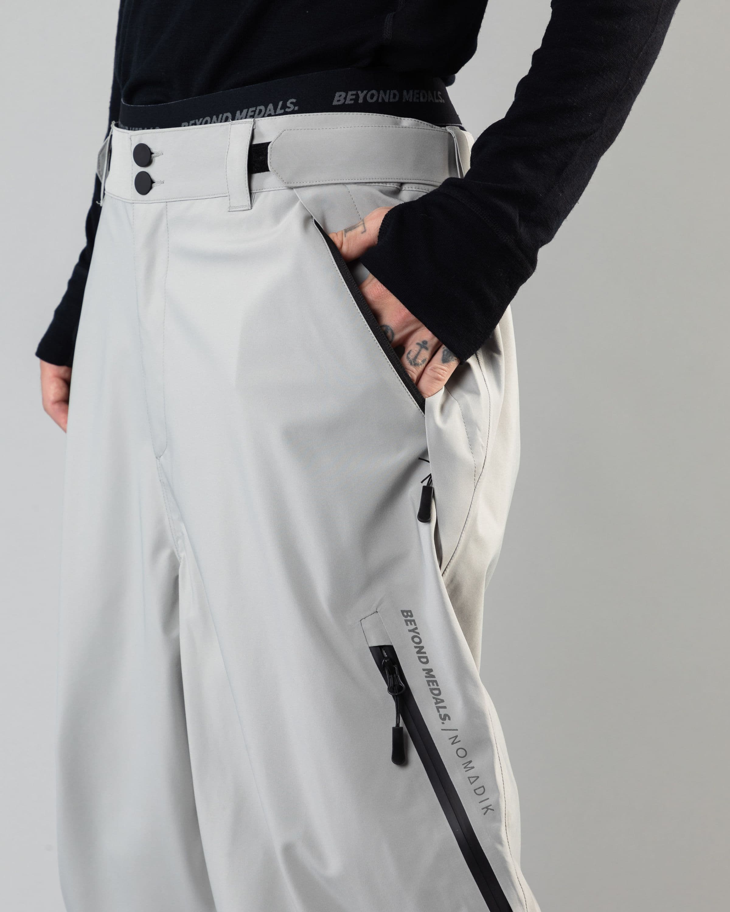 Outerwear clothing, beyond medals x nomadik pants 3l in grey worn by KEVIN BÄCKSTRÖM, Beyond Medals, 2024, detail4