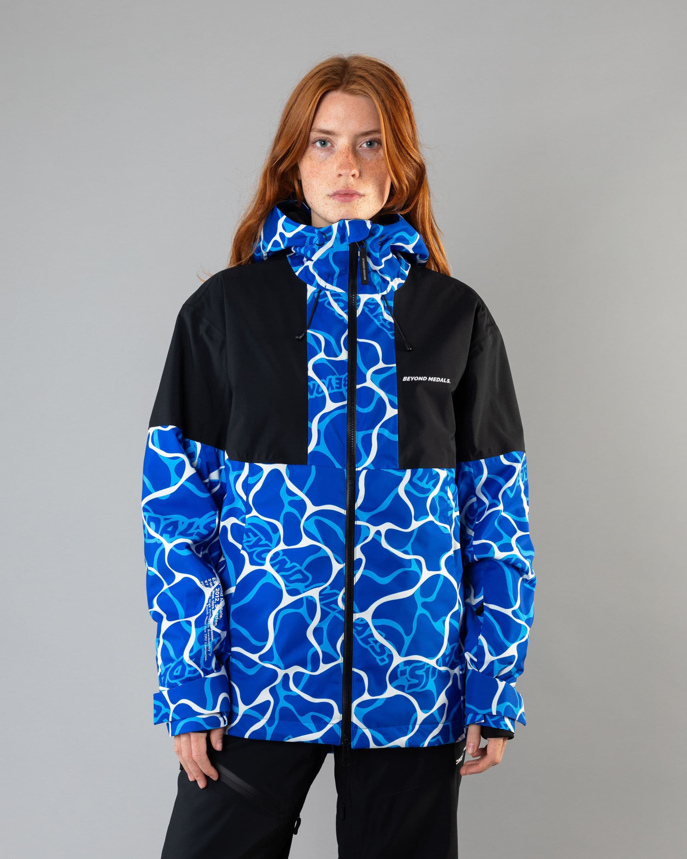 Outerwear clothing, fullzip jacket 2l in blue worn by model, Beyond Medals, 2024, front