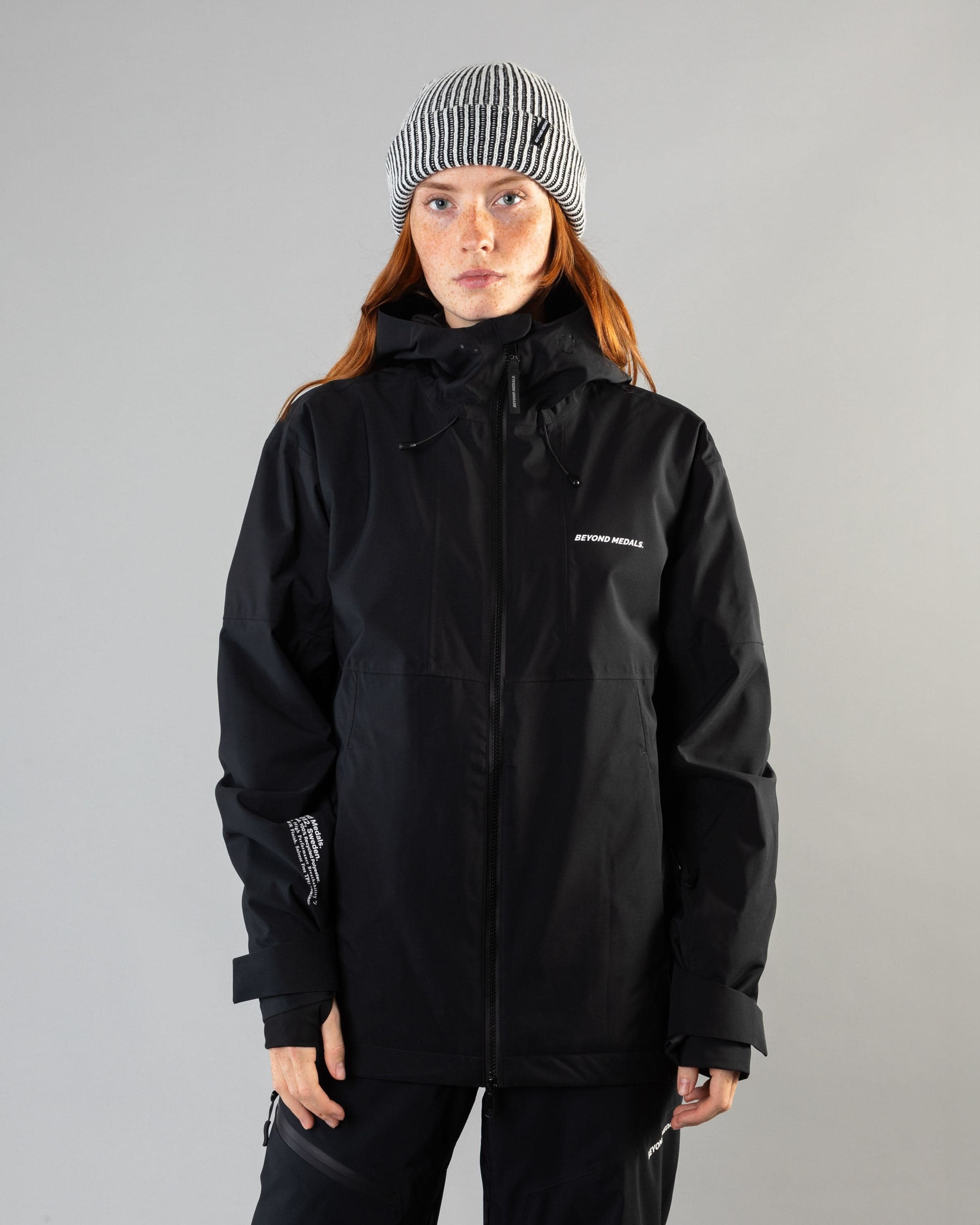 Outerwear clothing, fullzip jacket 2l in black worn by model, Beyond Medals, 2024, front