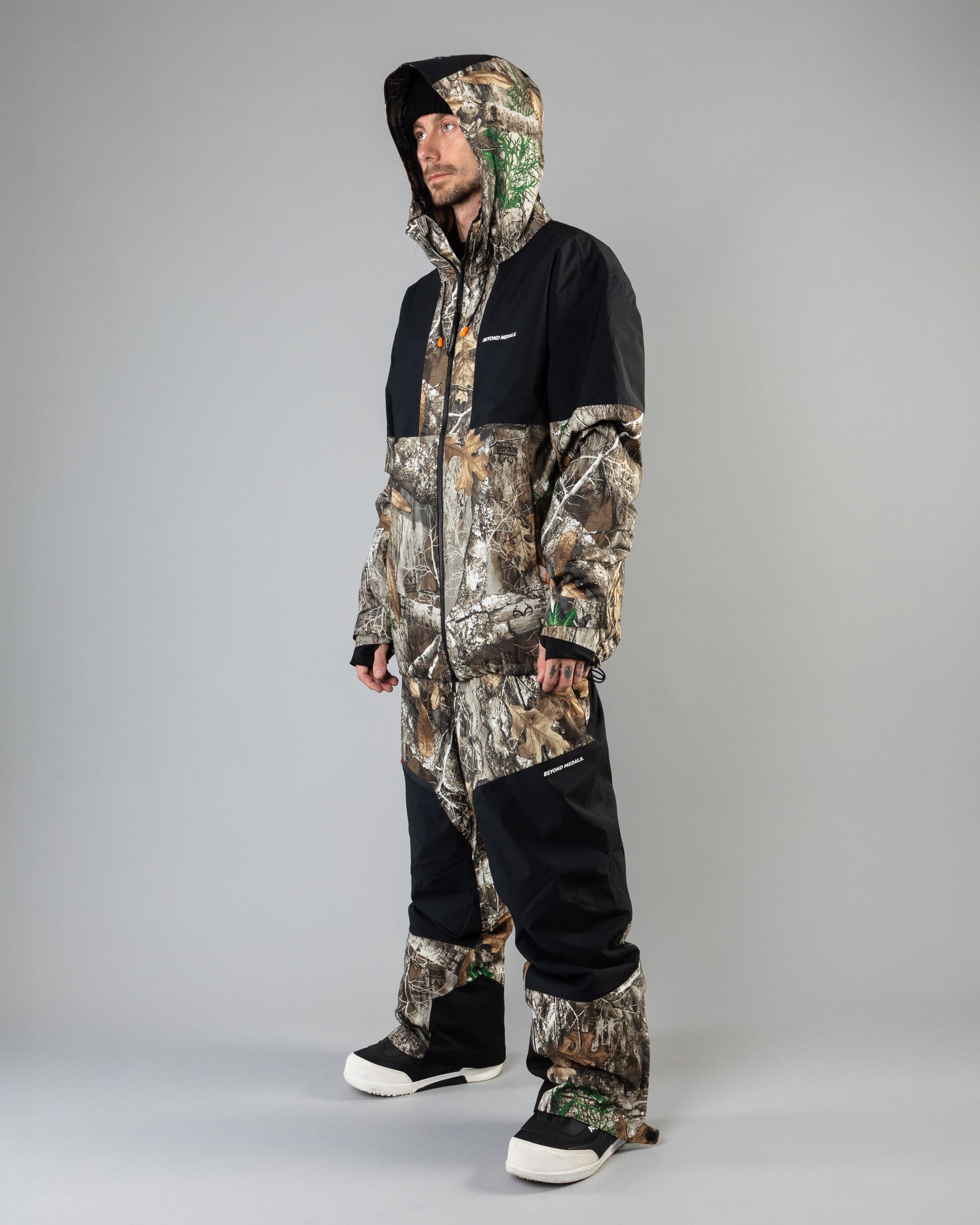 Outerwear clothing, zip pants 2l in realtree worn by KEVIN BÄCKSTRÖM, Beyond Medals, 2024, full front