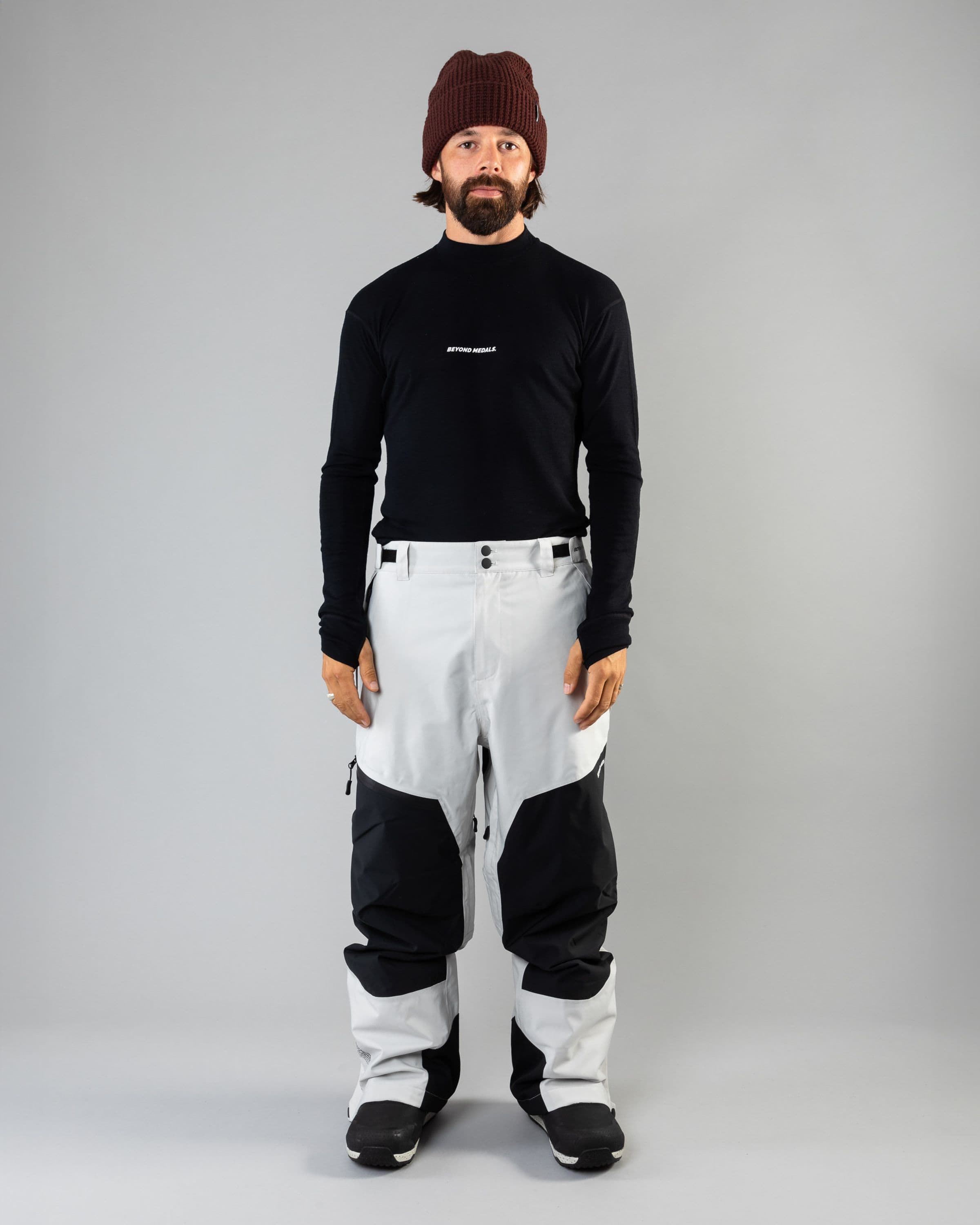 Outerwear clothing, zip pants 2l in grey worn by ULRIK BADERTSCHER, Beyond Medals, 2024, full front