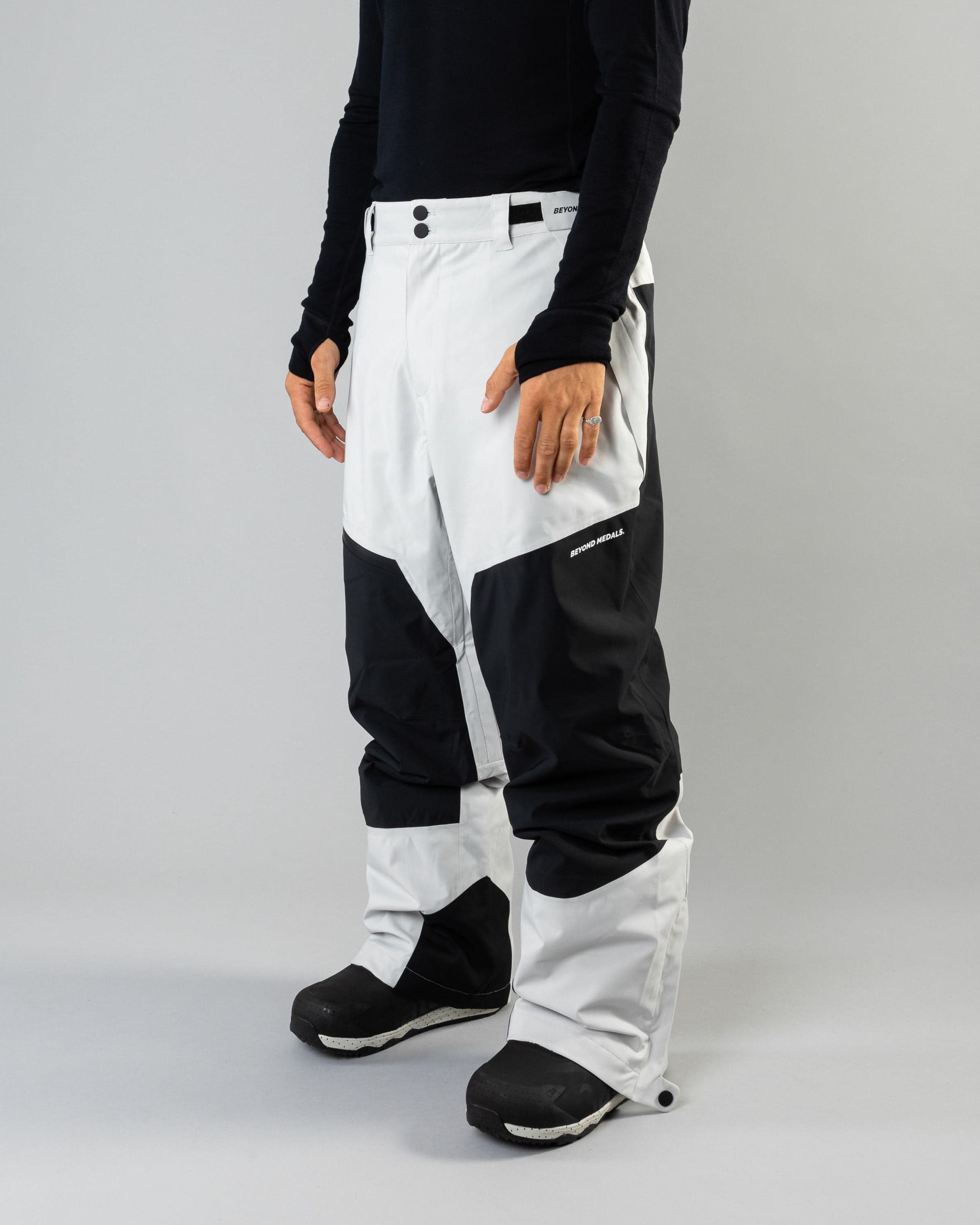 Outerwear clothing, zip pants 2l in grey worn by ULRIK BADERTSCHER, Beyond Medals, 2024, front