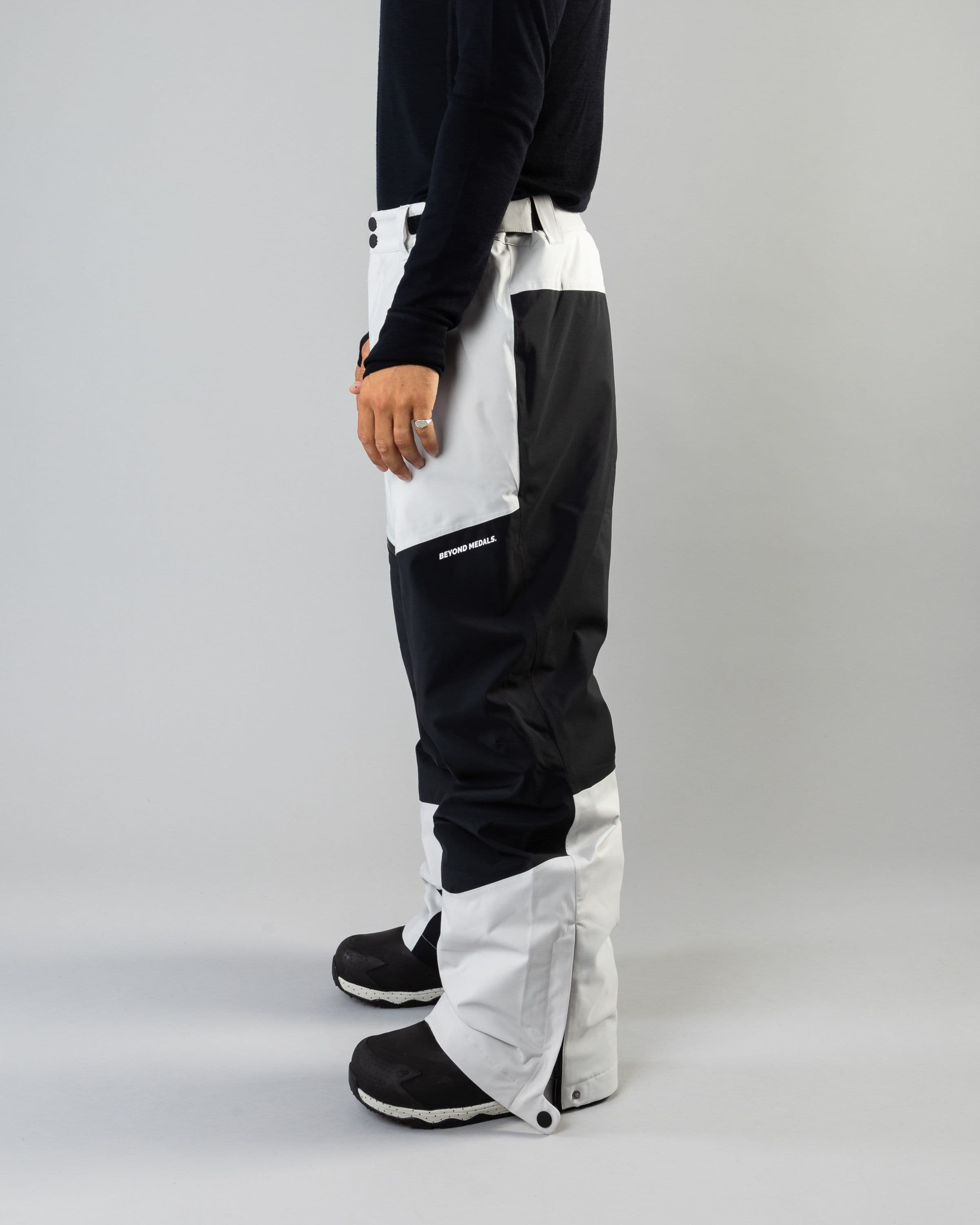 Outerwear clothing, zip pants 2l in grey worn by ULRIK BADERTSCHER, Beyond Medals, 2024, side