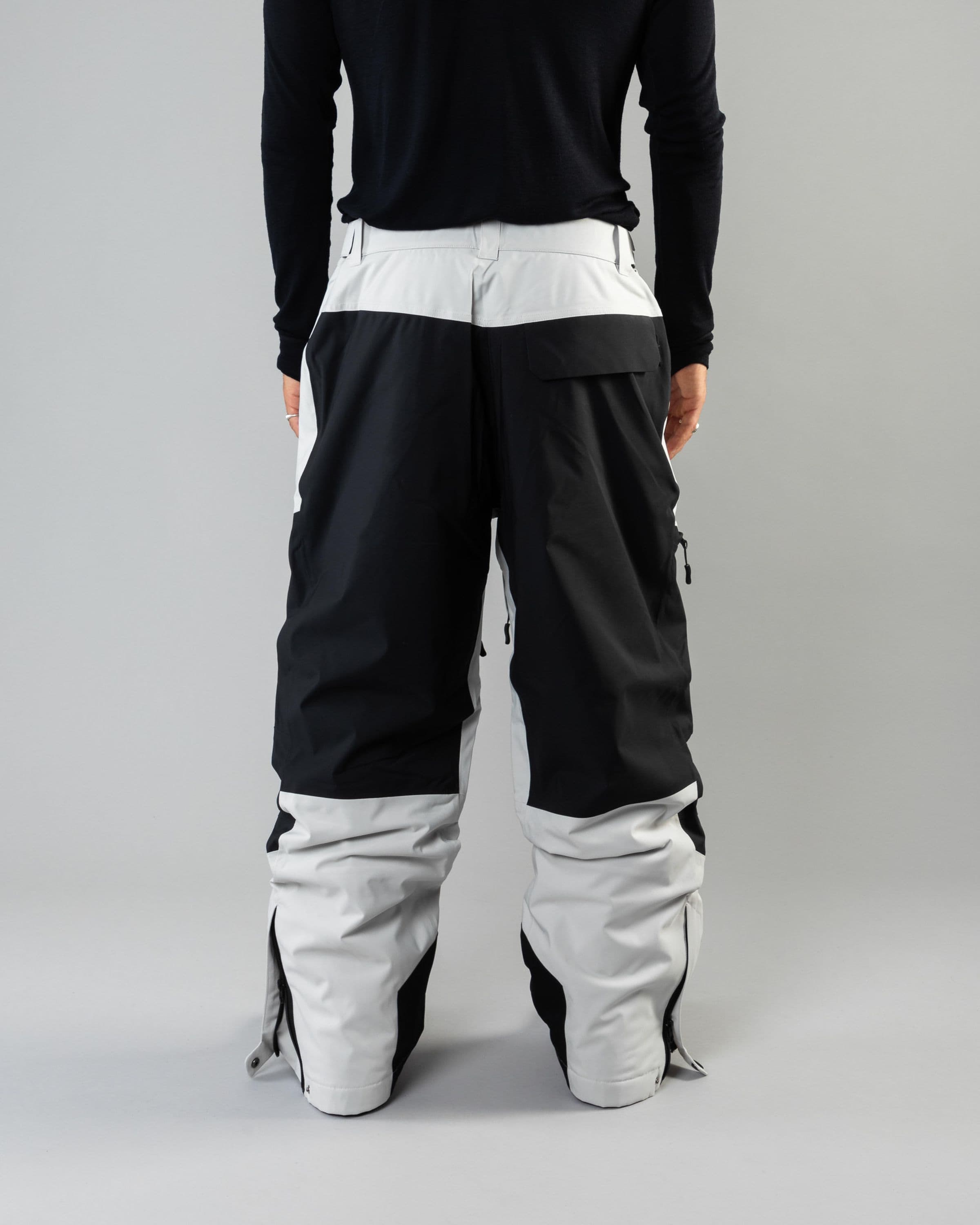 Outerwear clothing, zip pants 2l in grey worn by ULRIK BADERTSCHER, Beyond Medals, 2024, back