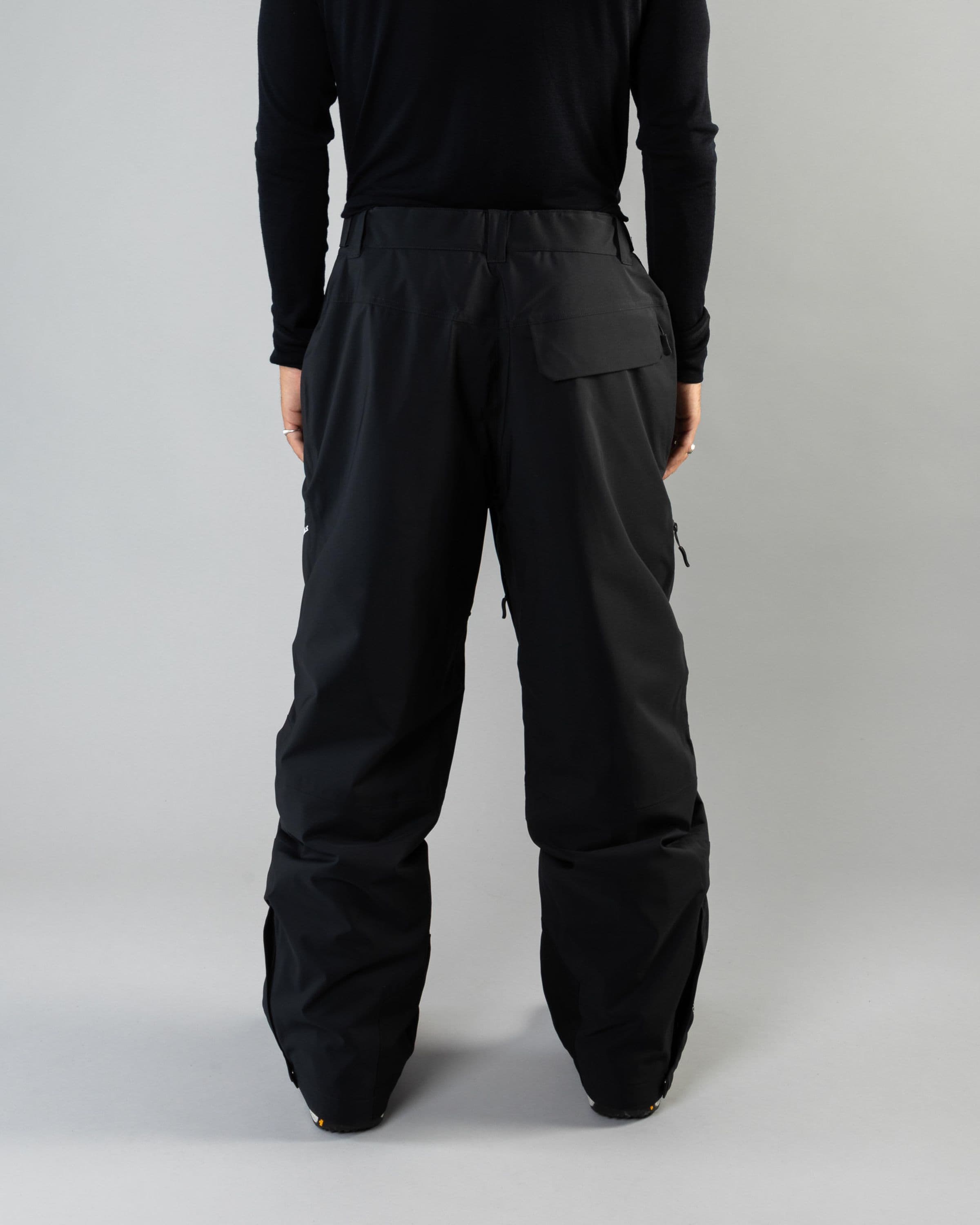 Outerwear clothing, zip pants 2l in black worn by ULRIK BADERTSCHER, Beyond Medals, 2024, back