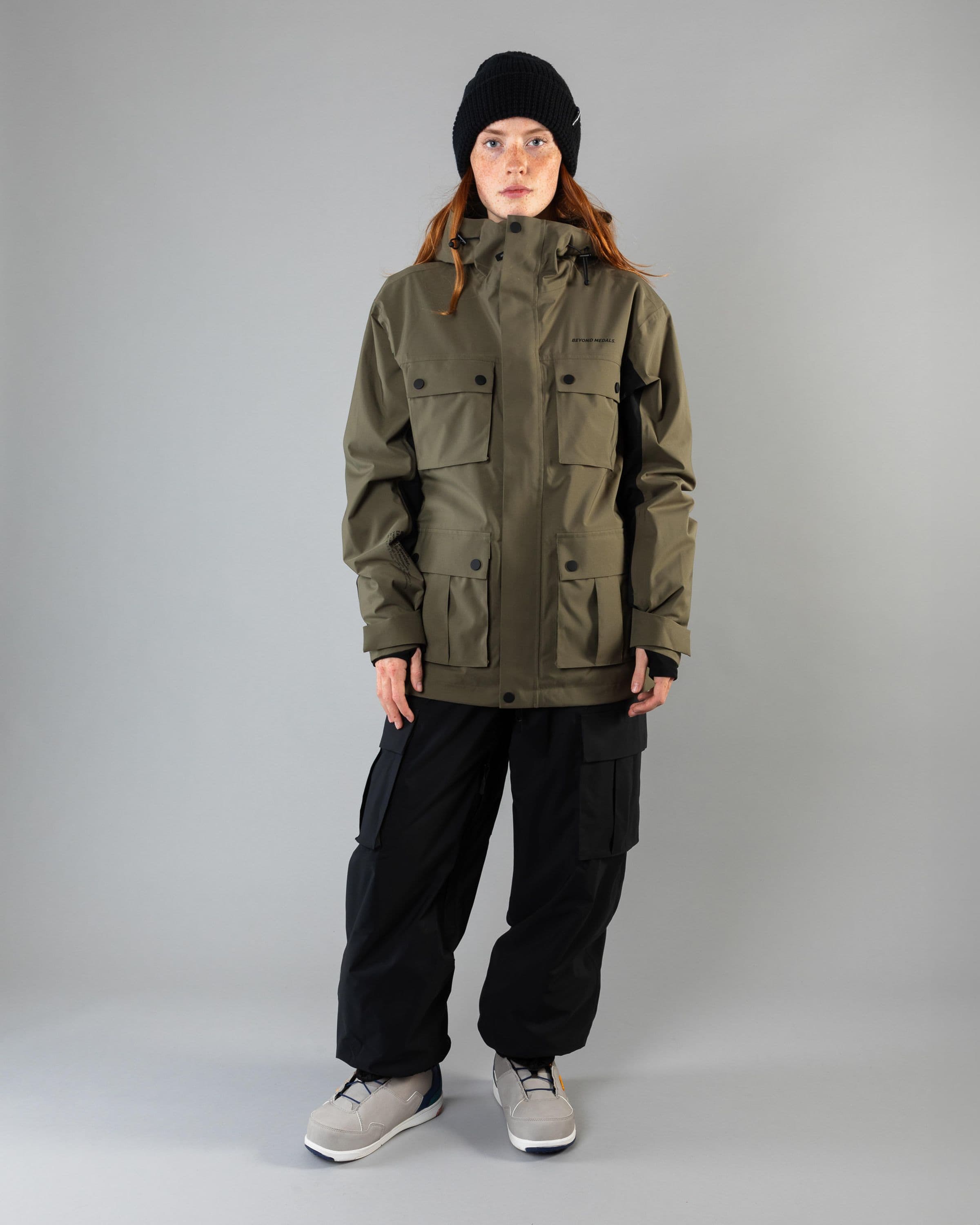 Outerwear clothing, cargo jacket 2l in green worn by model, Beyond Medals, 2024, full front