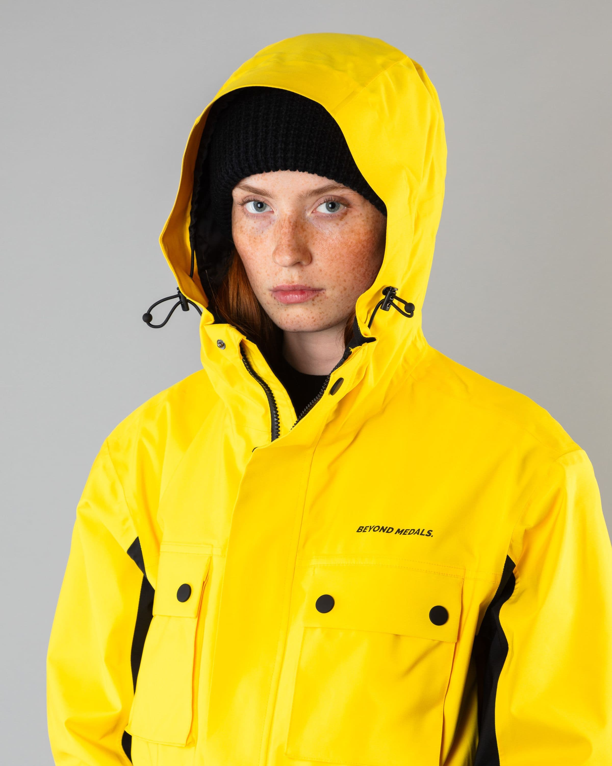 Outerwear clothing, cargo jacket 2l in yellow worn by model, Beyond Medals, 2024, detail1
