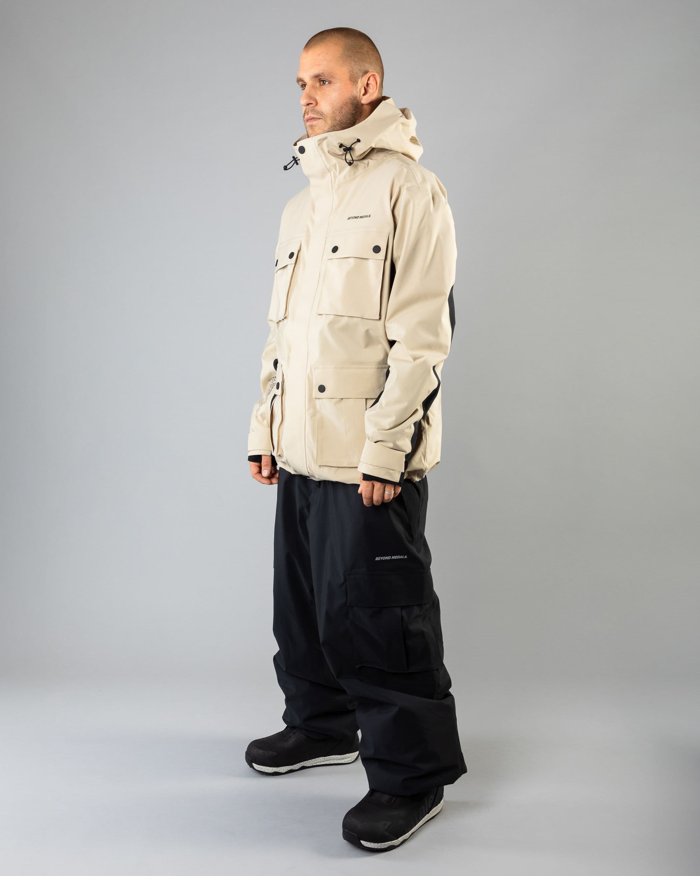 Outerwear clothing, cargo jacket 2l in beige worn by TOR LUNDSTRÖM, Beyond Medals, 2024, full front