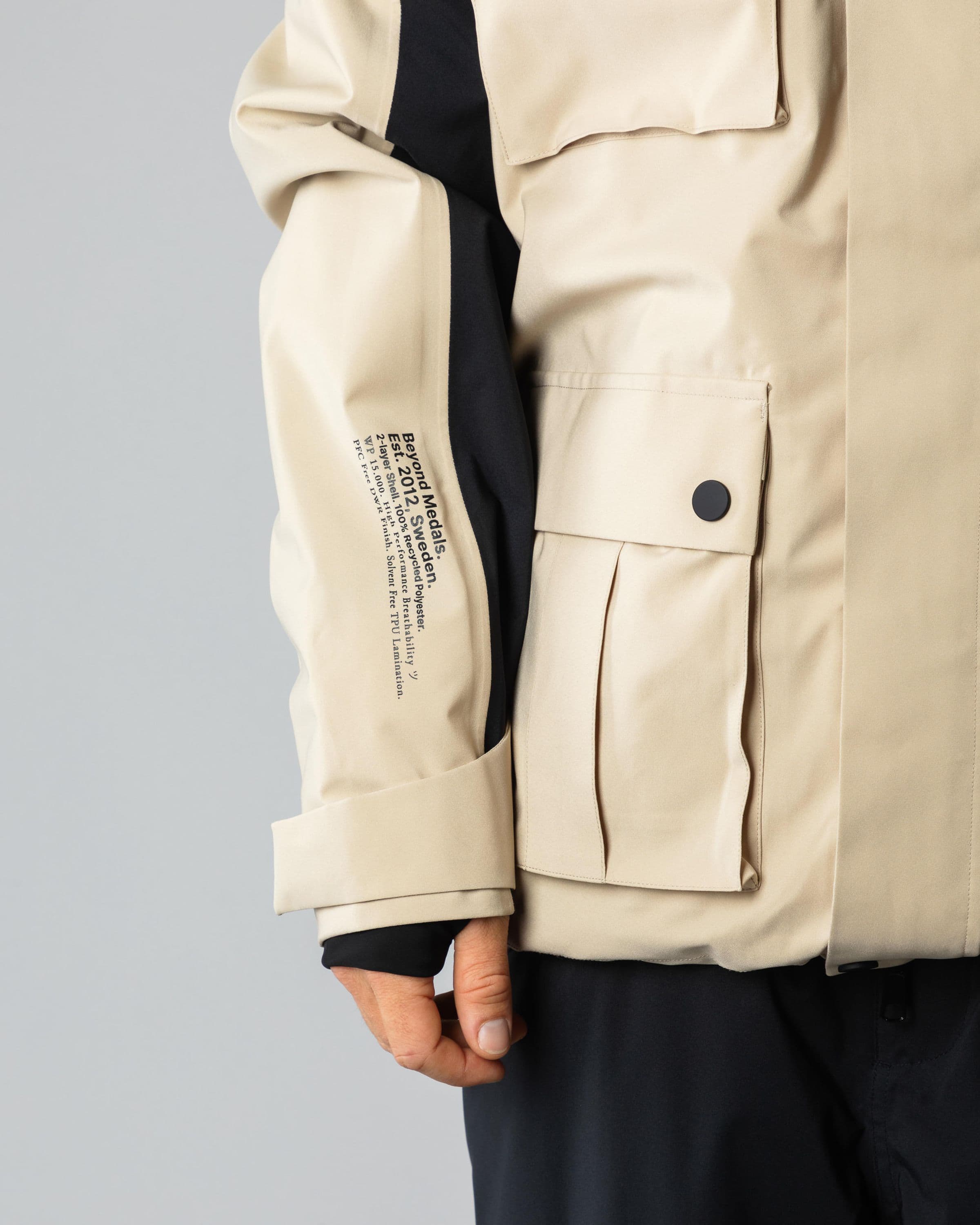 Outerwear clothing, cargo jacket 2l in beige worn by TOR LUNDSTRÖM, Beyond Medals, 2024, detail8