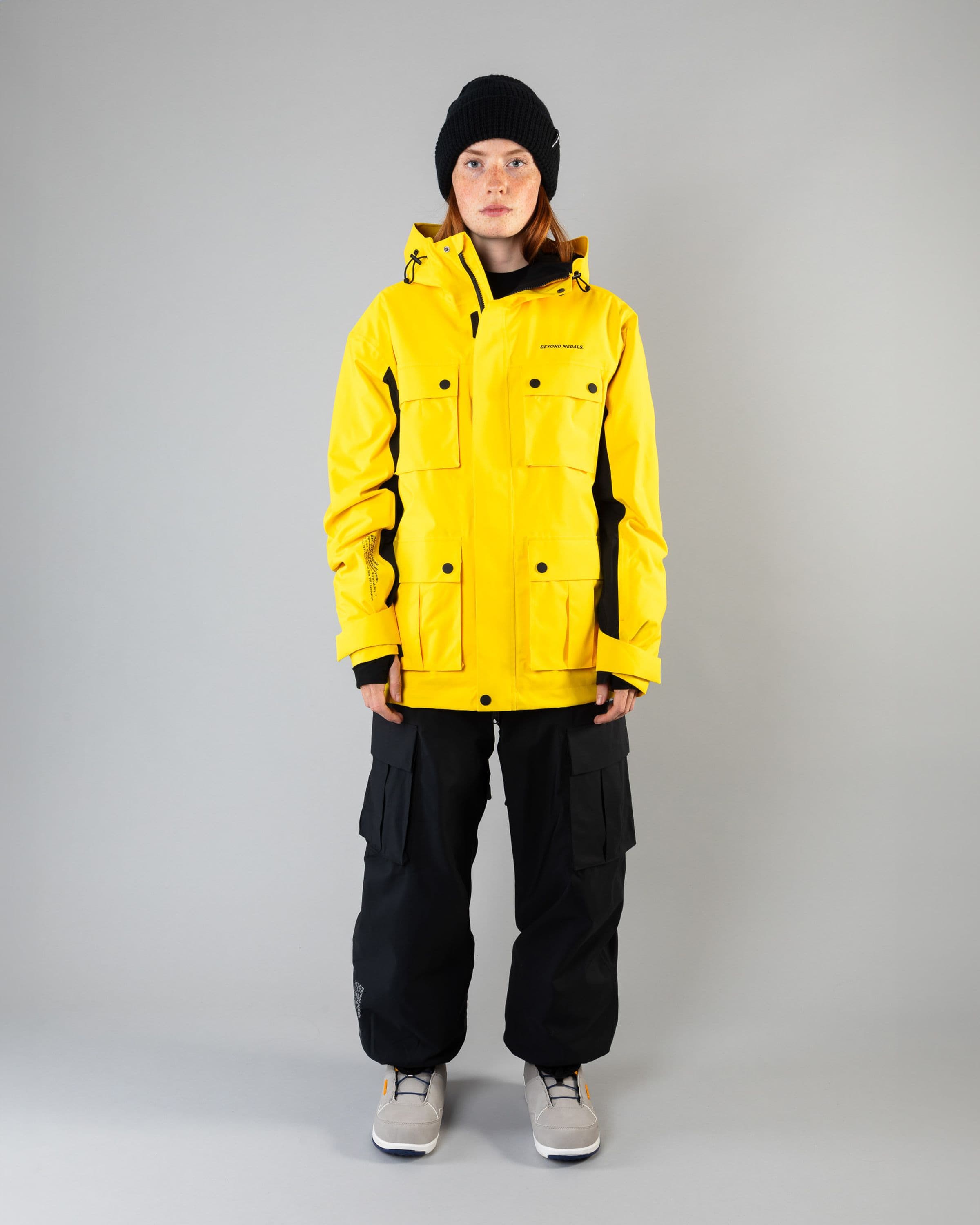 Outerwear clothing, cargo jacket 2l in yellow worn by model, Beyond Medals, 2024, full front