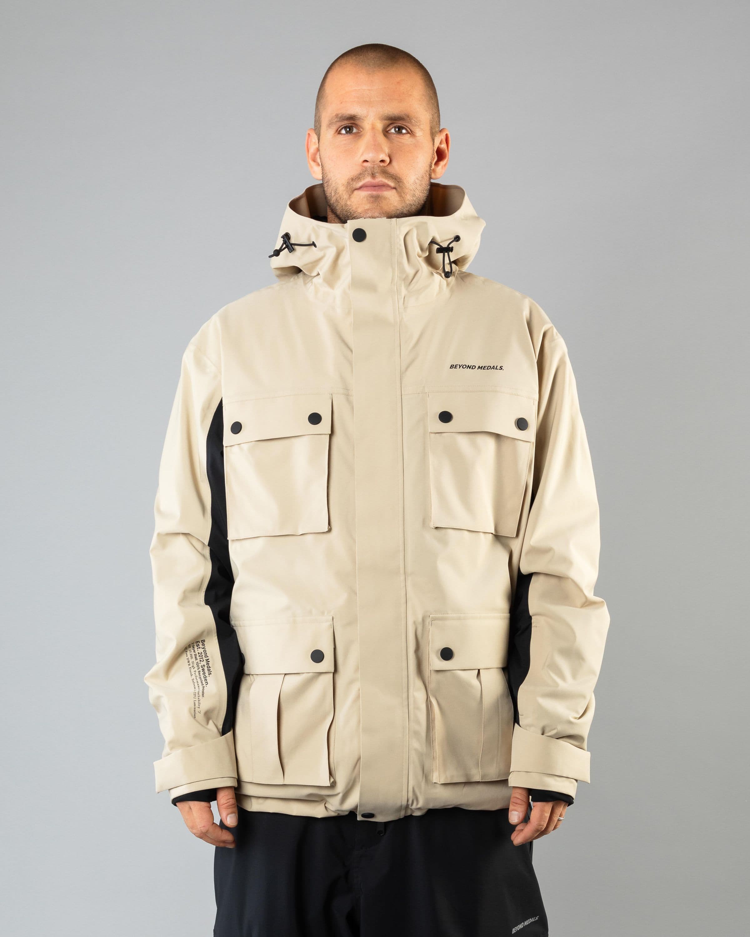 Outerwear clothing, cargo jacket 2l in beige worn by TOR LUNDSTRÖM, Beyond Medals, 2024, front