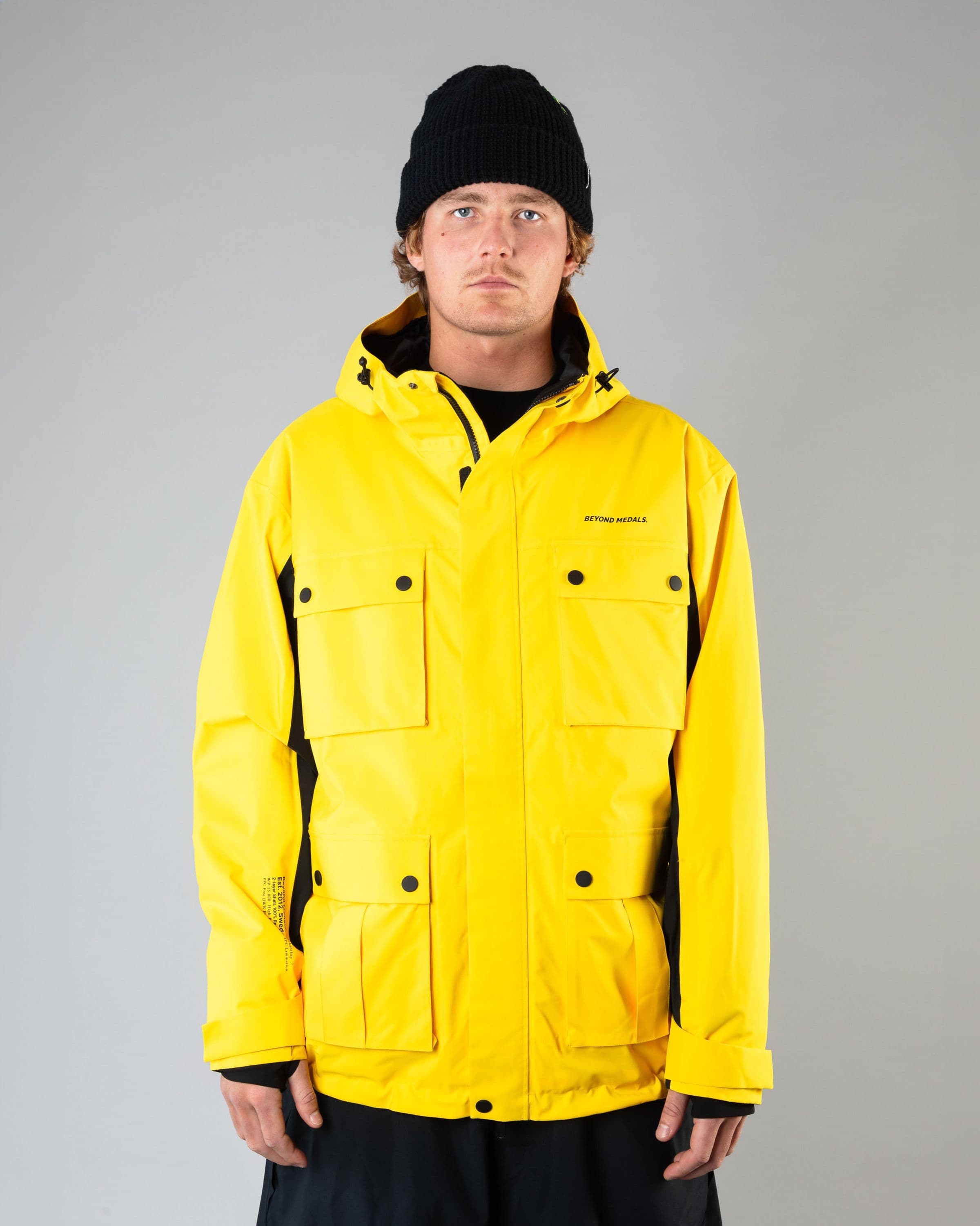 Outerwear clothing, cargo jacket 2l in yellow worn by SEBBE DE BUCK, Beyond Medals, 2024, front