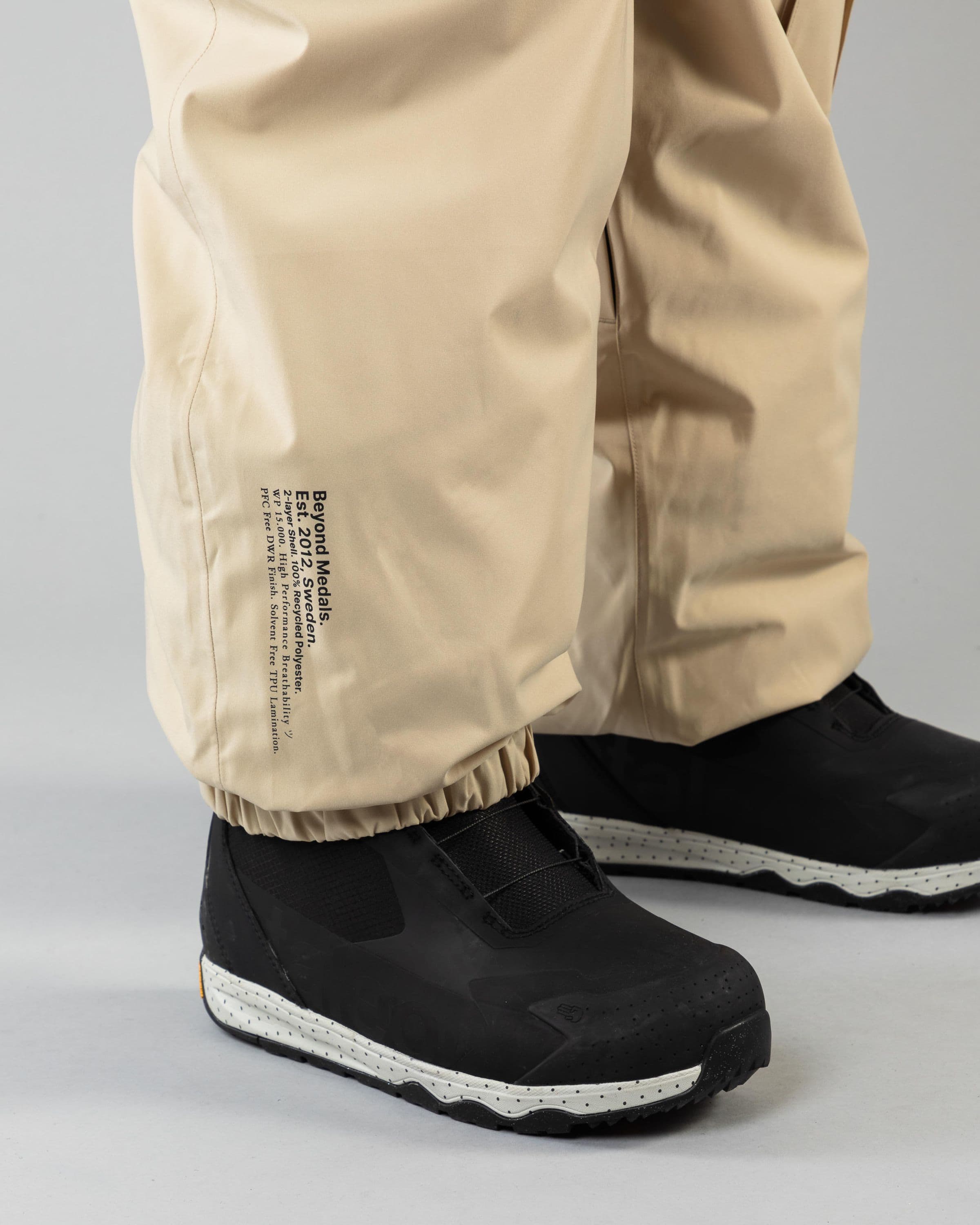 Outerwear clothing, cargo pants in beige worn by TOR LUNDSTRÖM, Beyond Medals, 2024, detail4